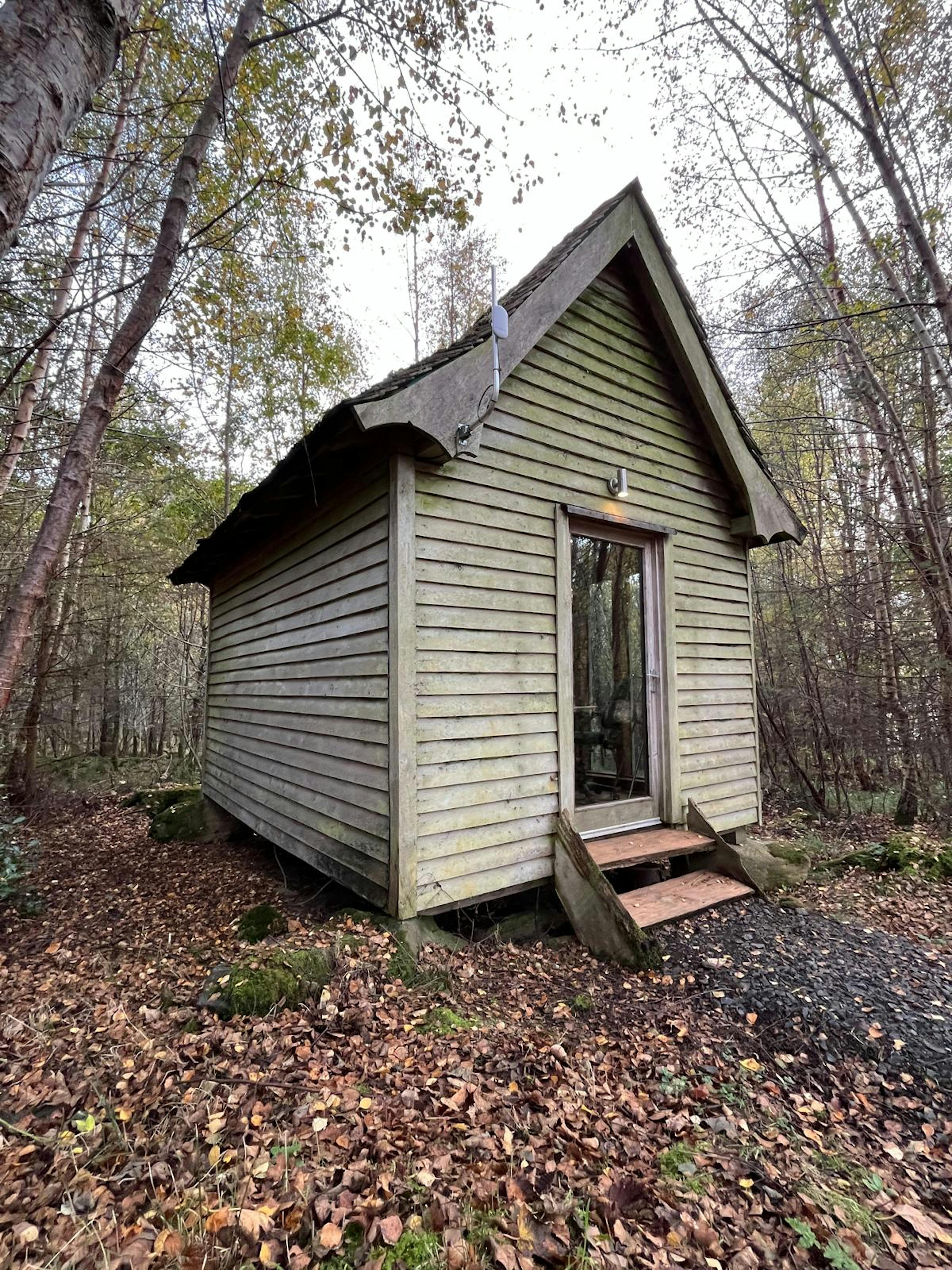 Completed oak timber frame for a small bothy in Scotland, assembled in the yard, showcasing exposed beams and precise joinery