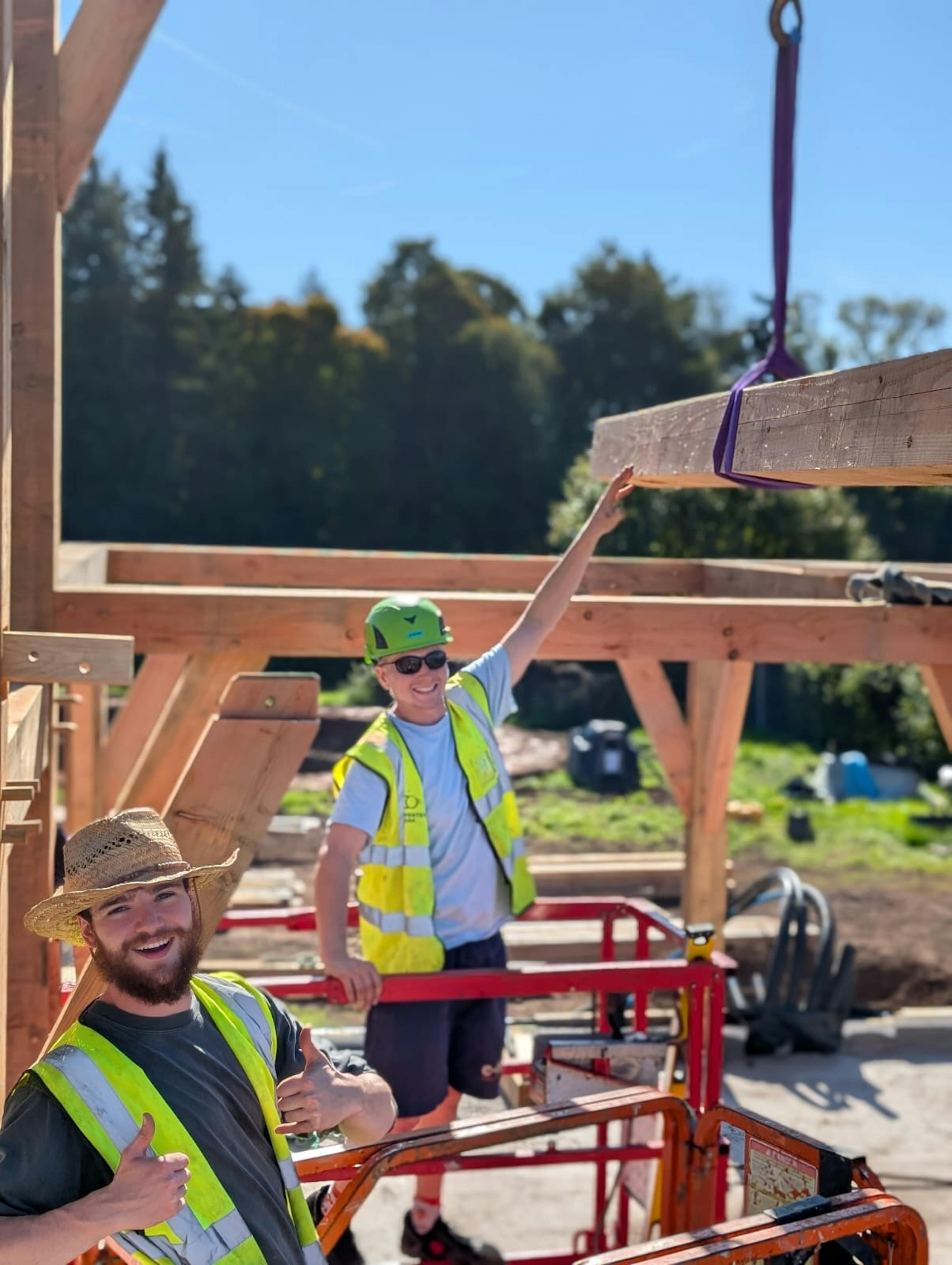 Site carpenters working together on a construction project in Scotland