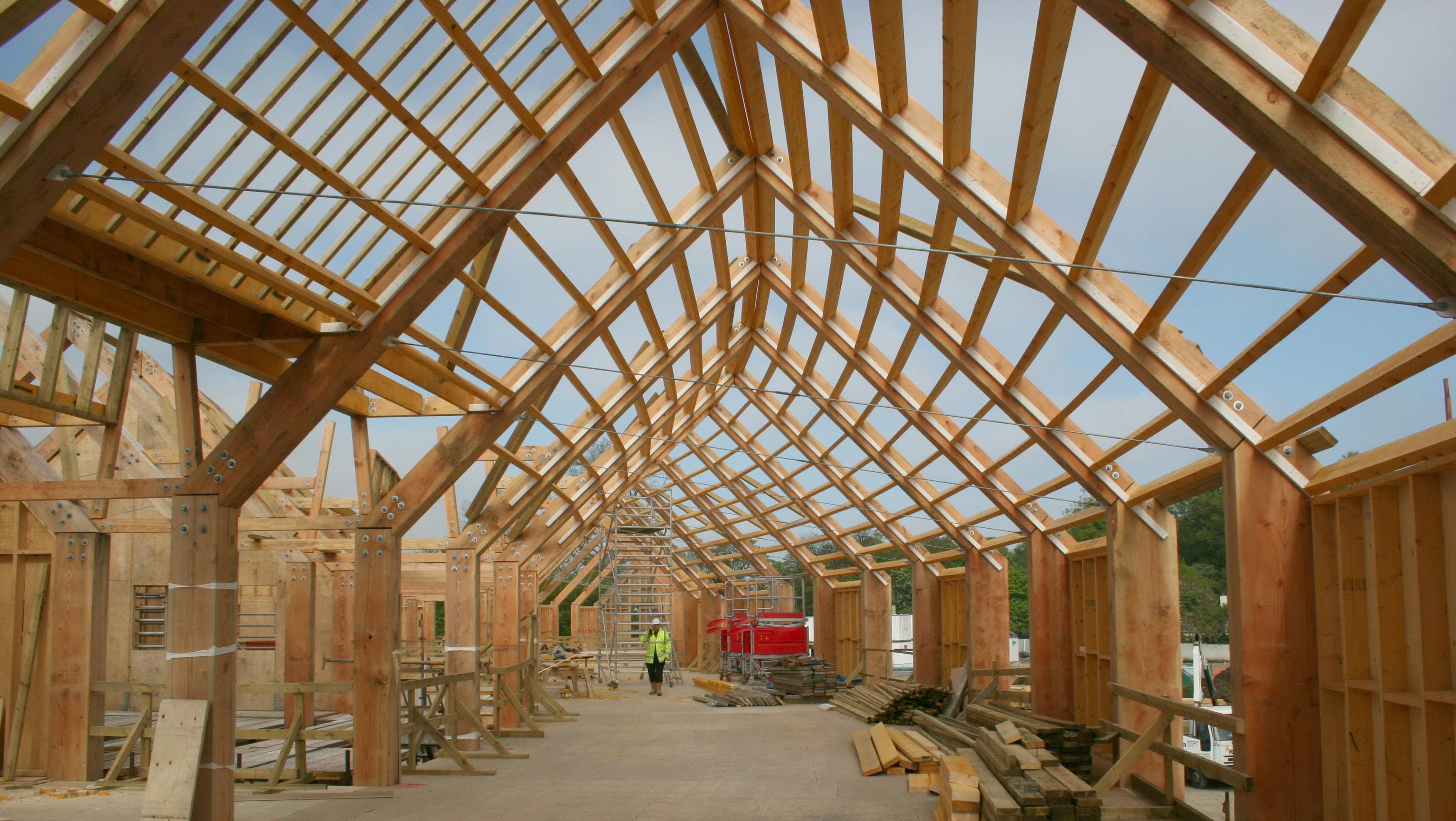Douglas fir and oak glulam roof structure under construction at the Balloch site, Loch Lomond National Park