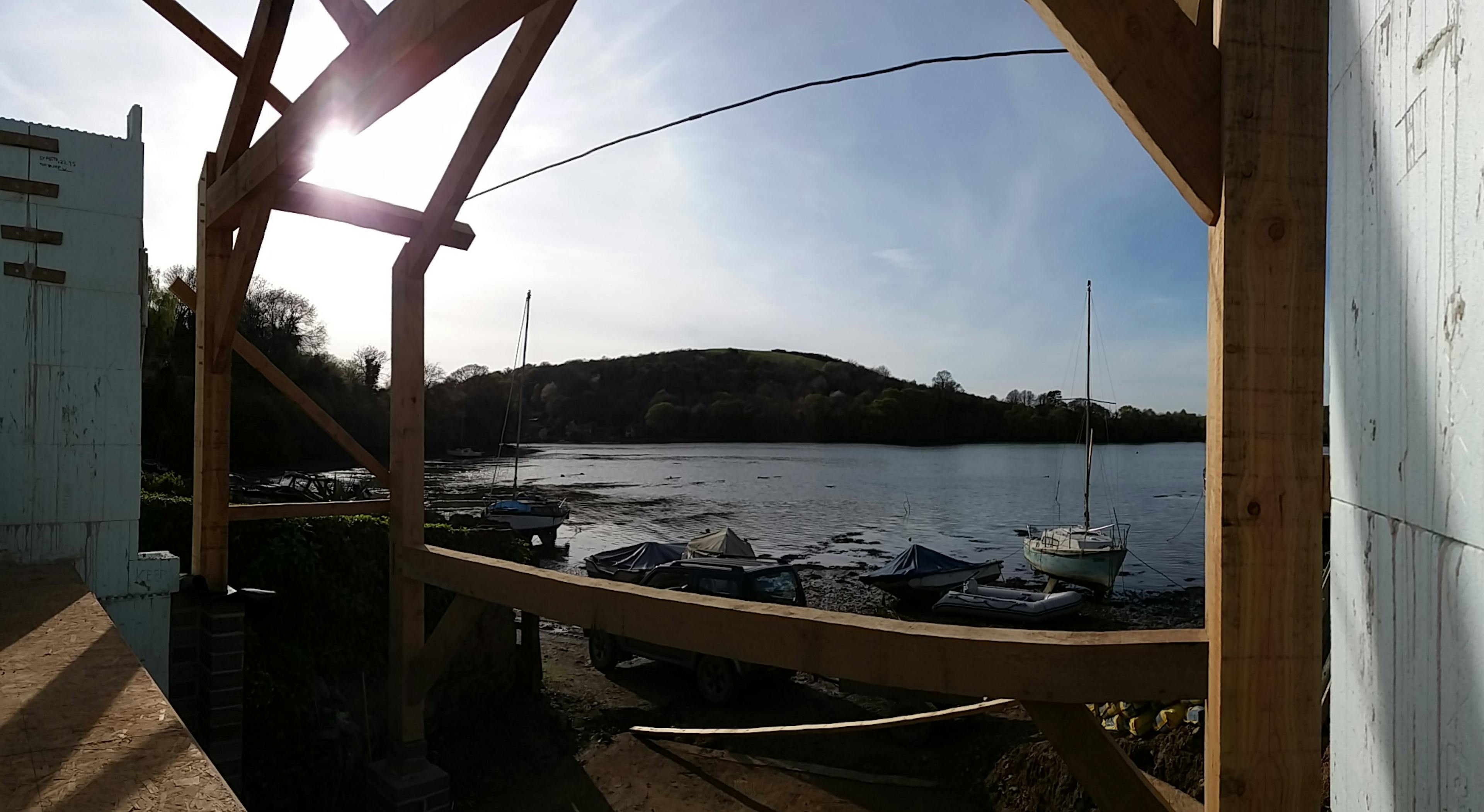 An oak frame of a boathouse during installation