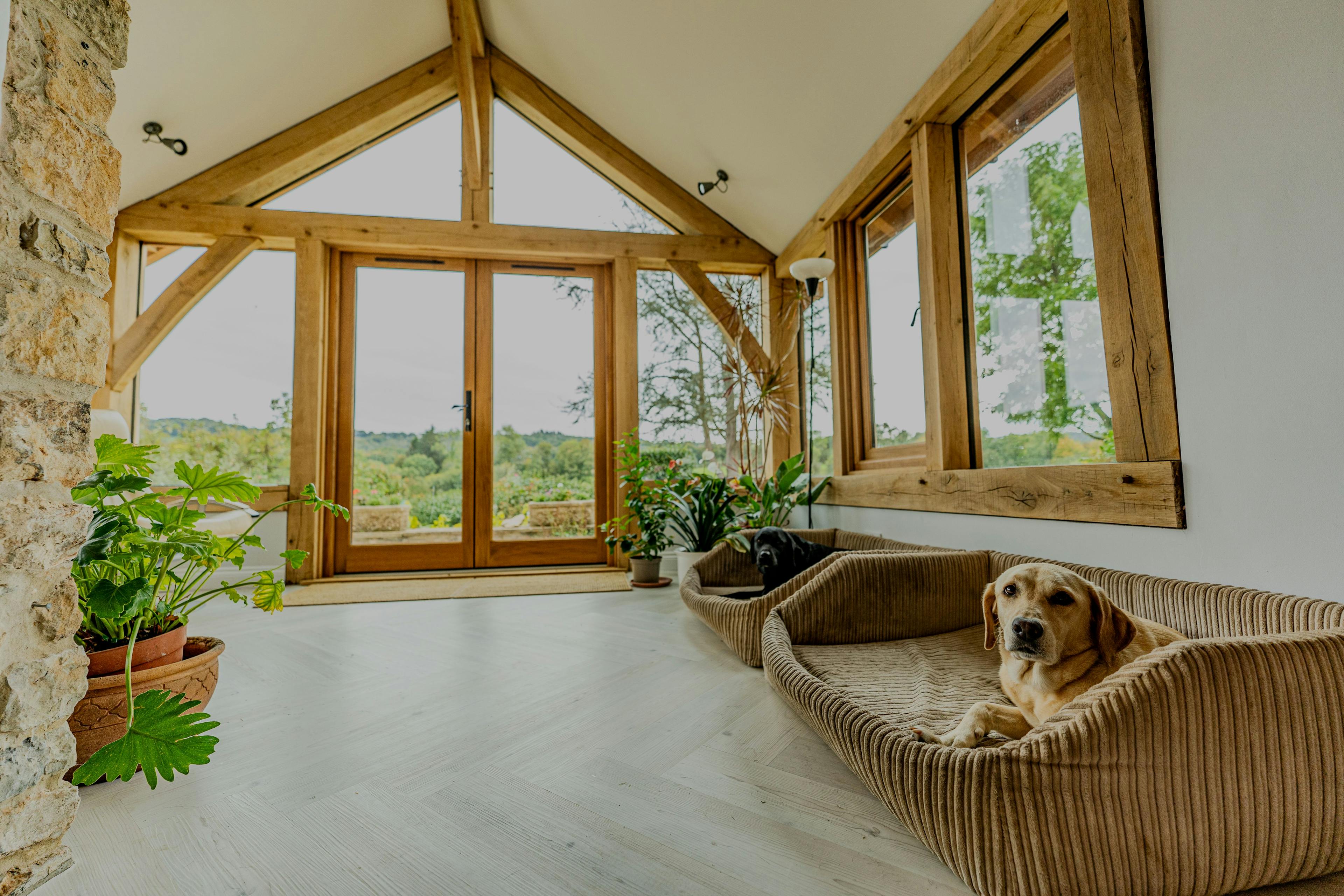 Interior of an oak frame garden room with direct glazing