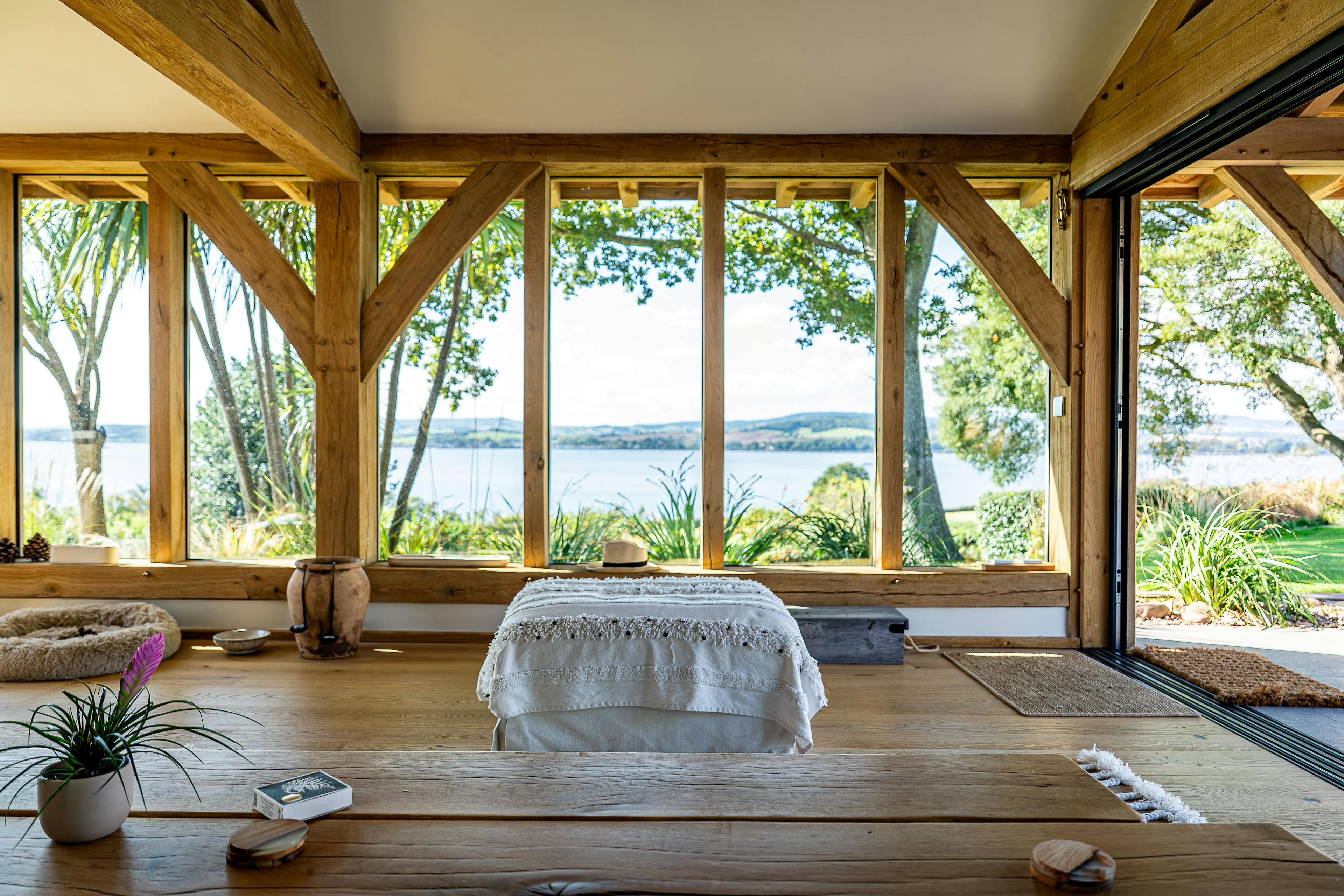 Inside an oak framed pool building annexe with a stylish living room