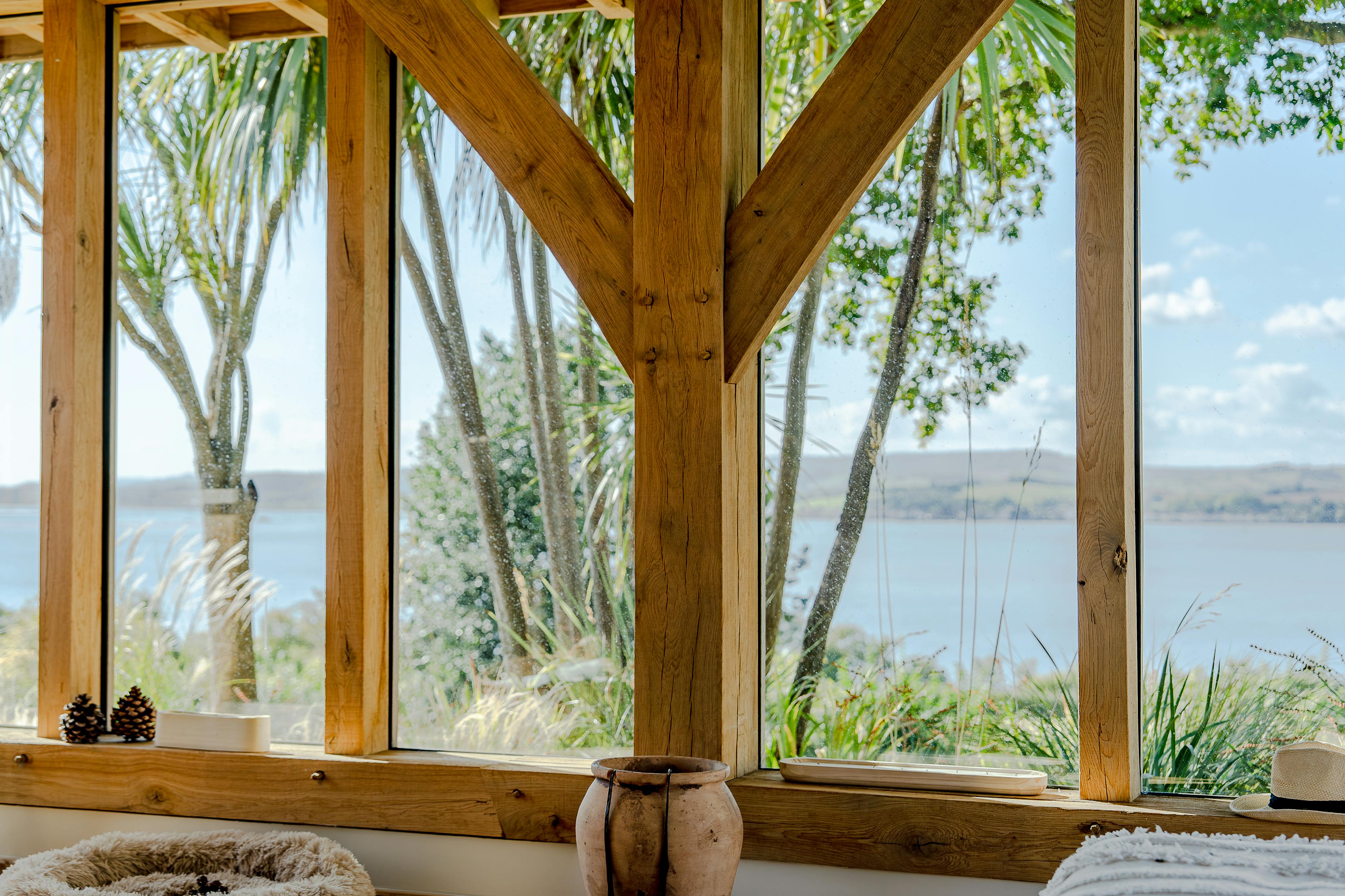 Inside an oak framed pool building annexe with views of the River Exe