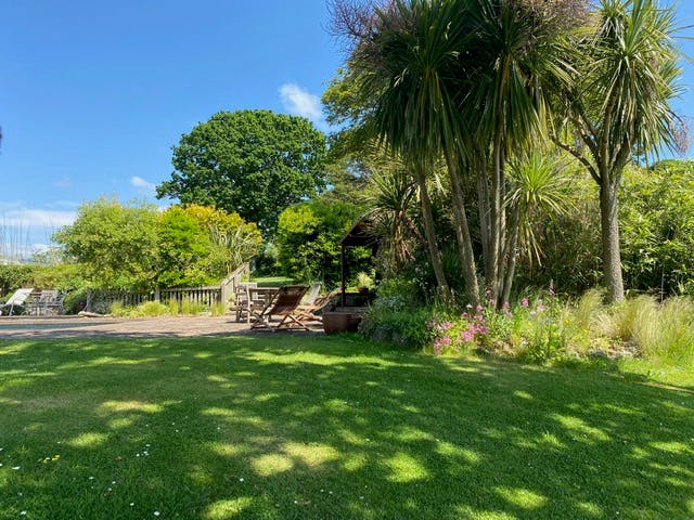 Site plan of the pool building, showing the surrounding landscape, and spatial orientation