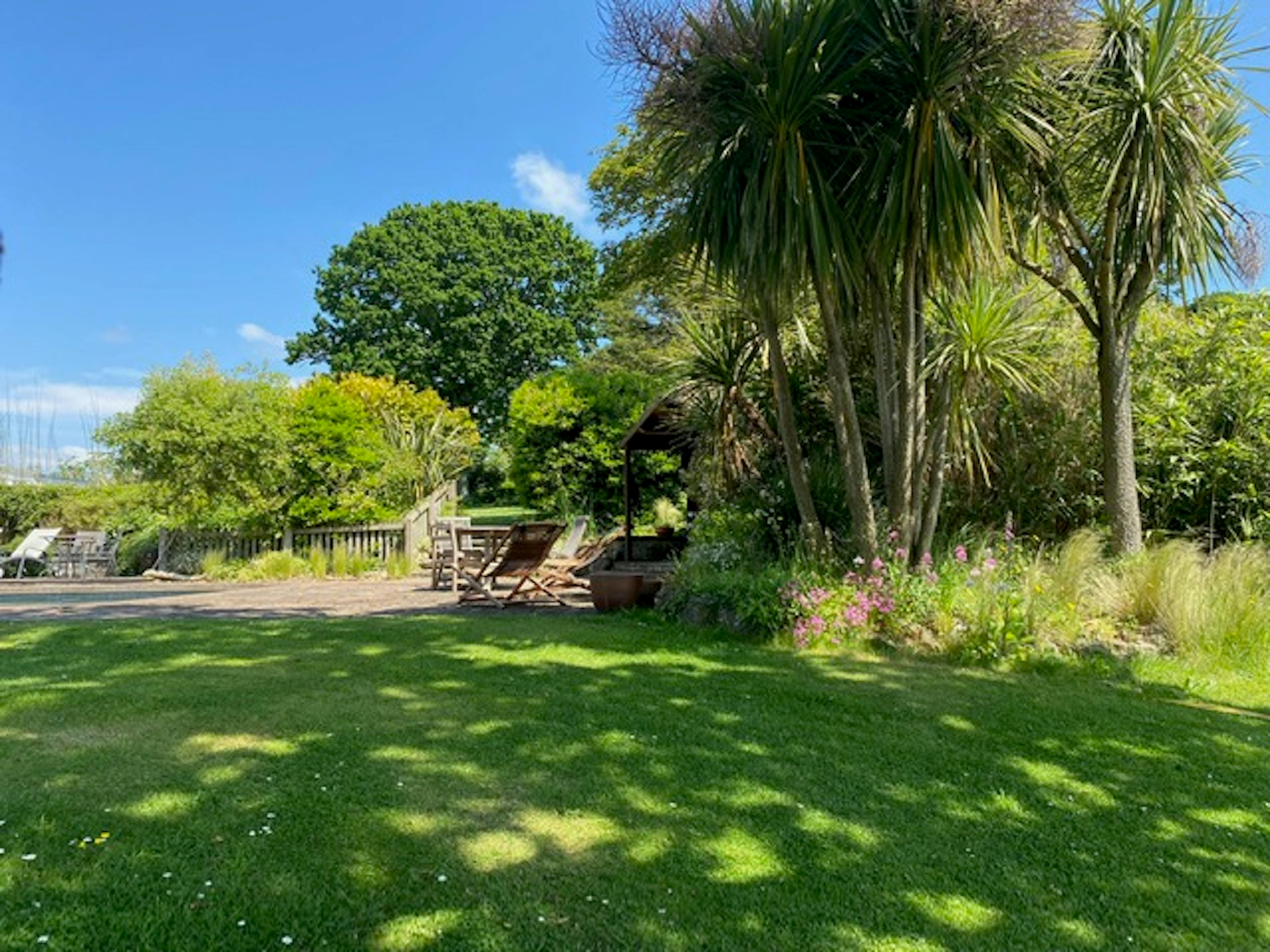 Site plan of the pool building, showing the surrounding landscape, and spatial orientation