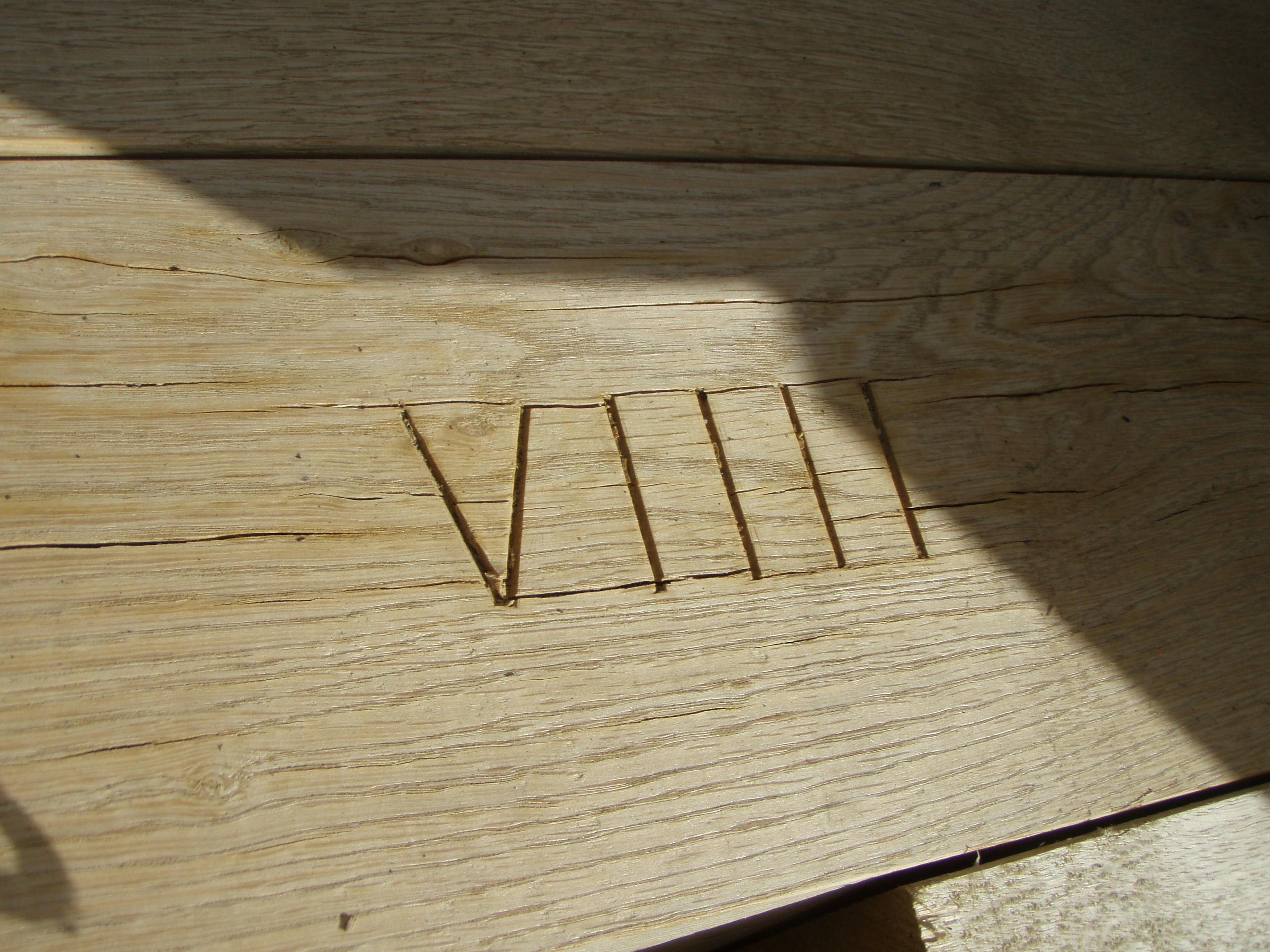 An oak frame being with carpenter's marks
