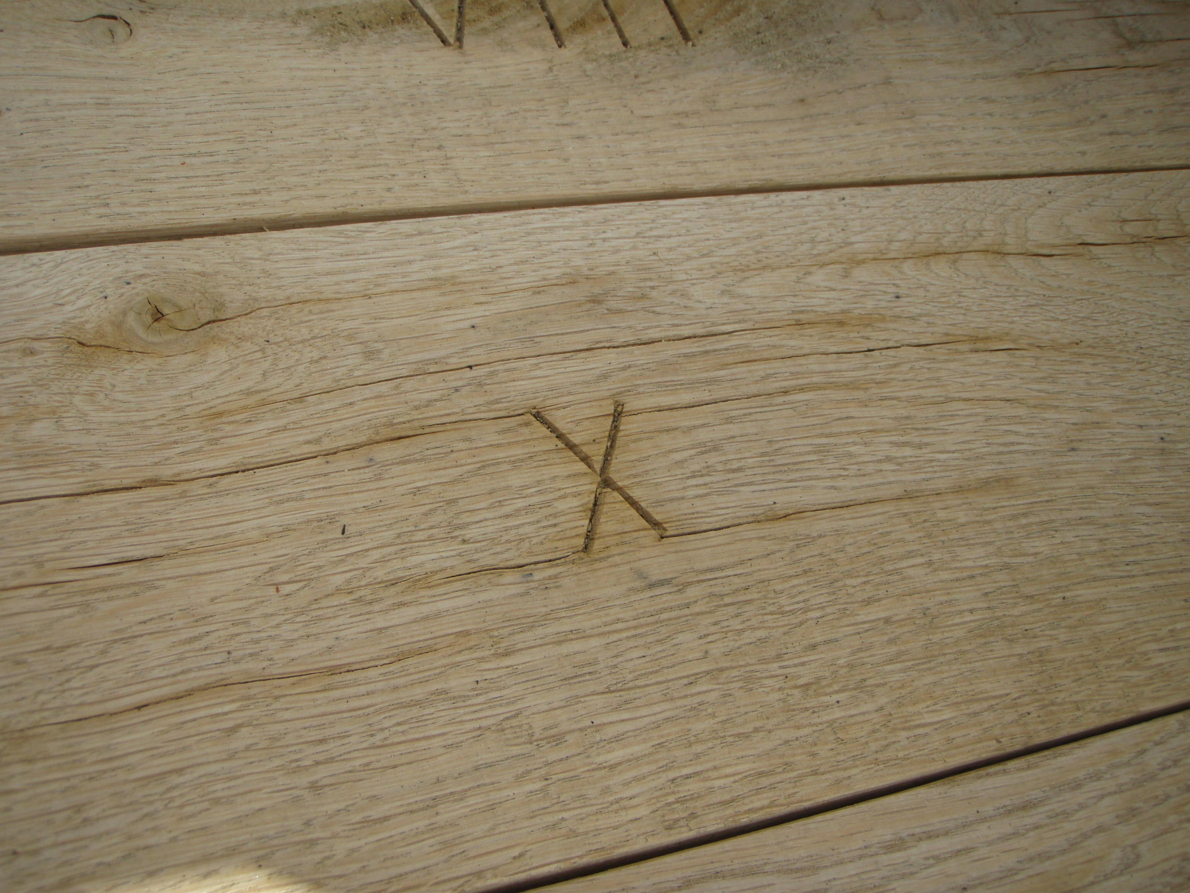 An oak frame being with carpenter's marks