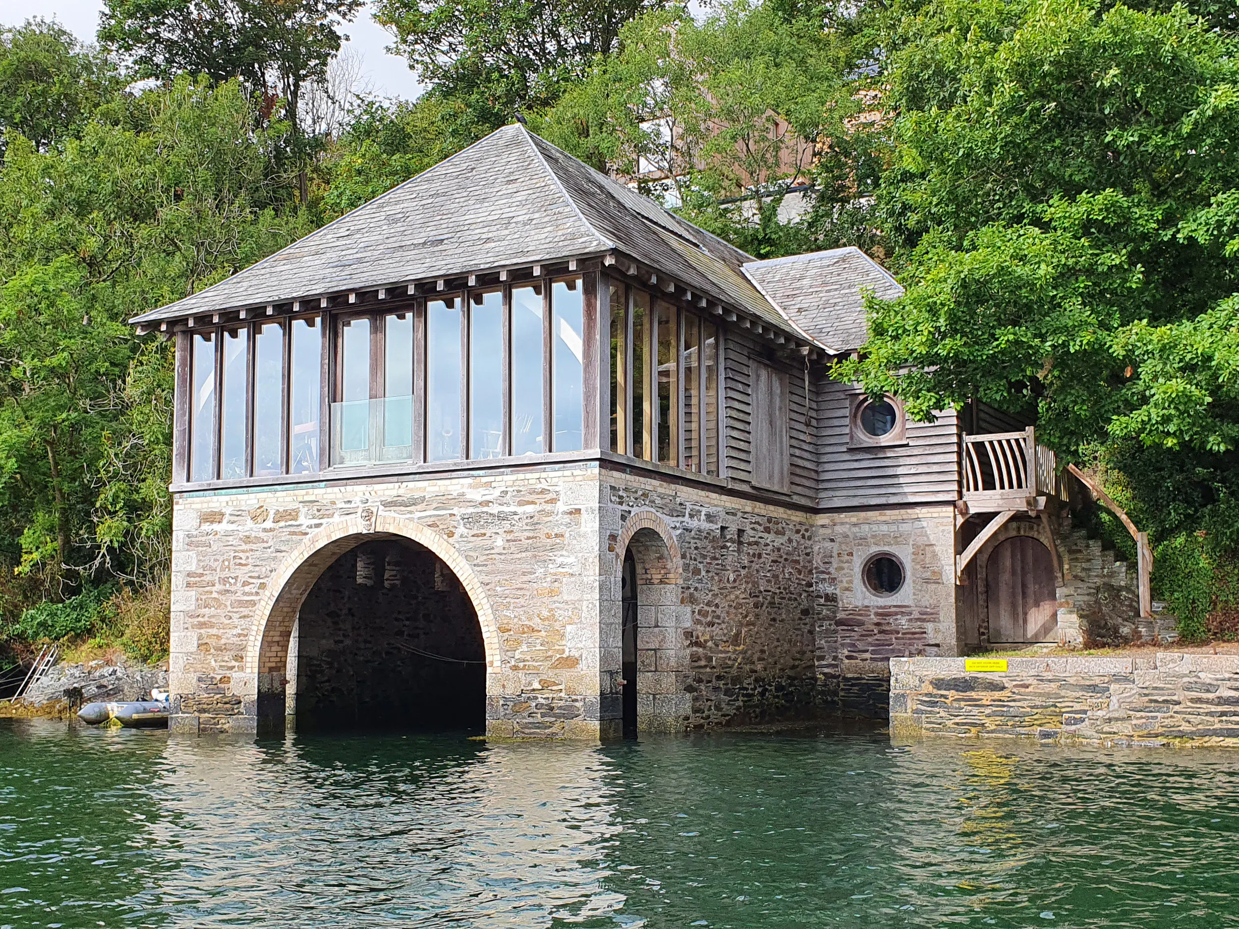 An oak framed retreat on top of a stone boathouse on the River Fowey