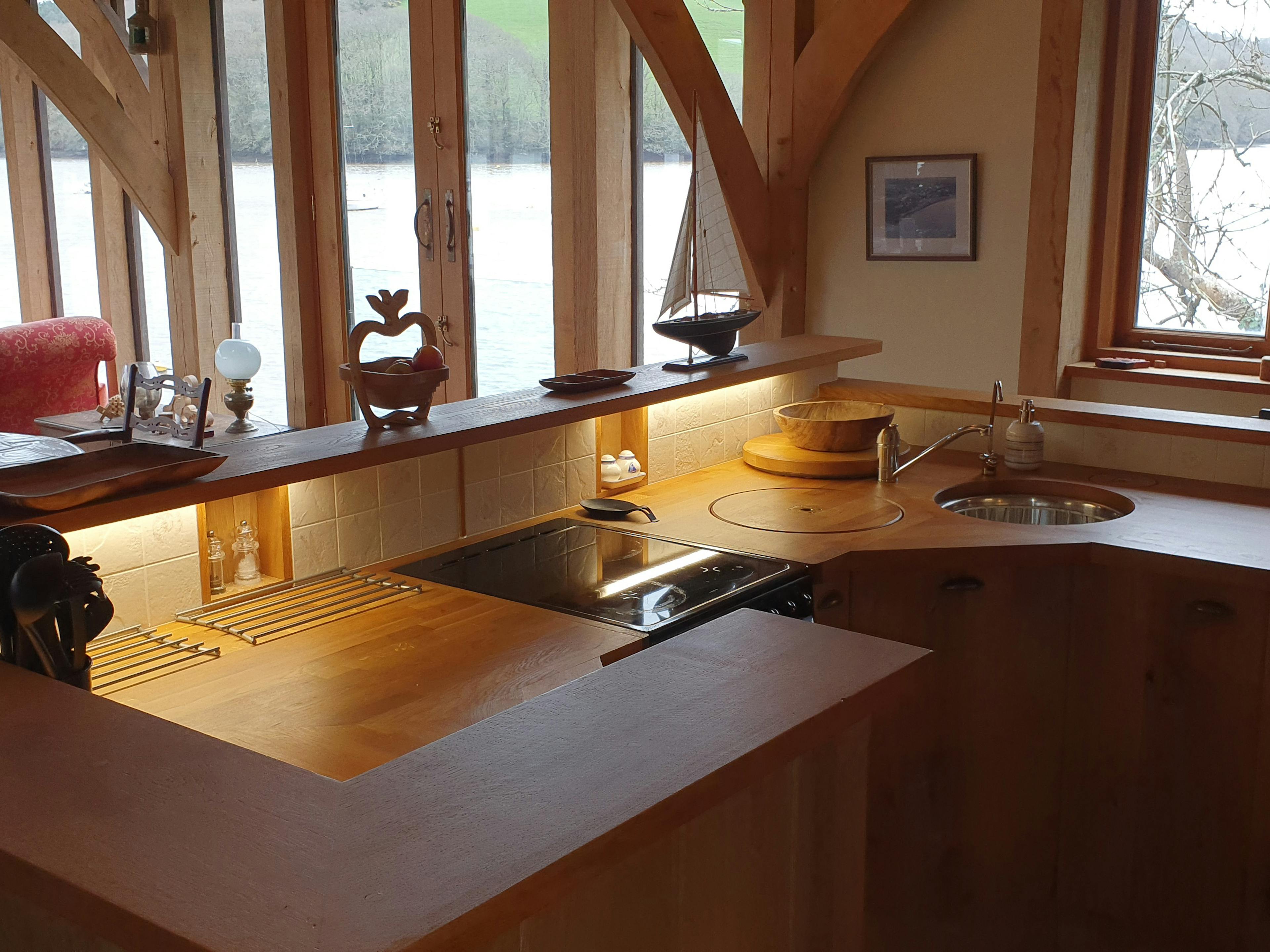 The kitchen area of an oak framed boathouse 
