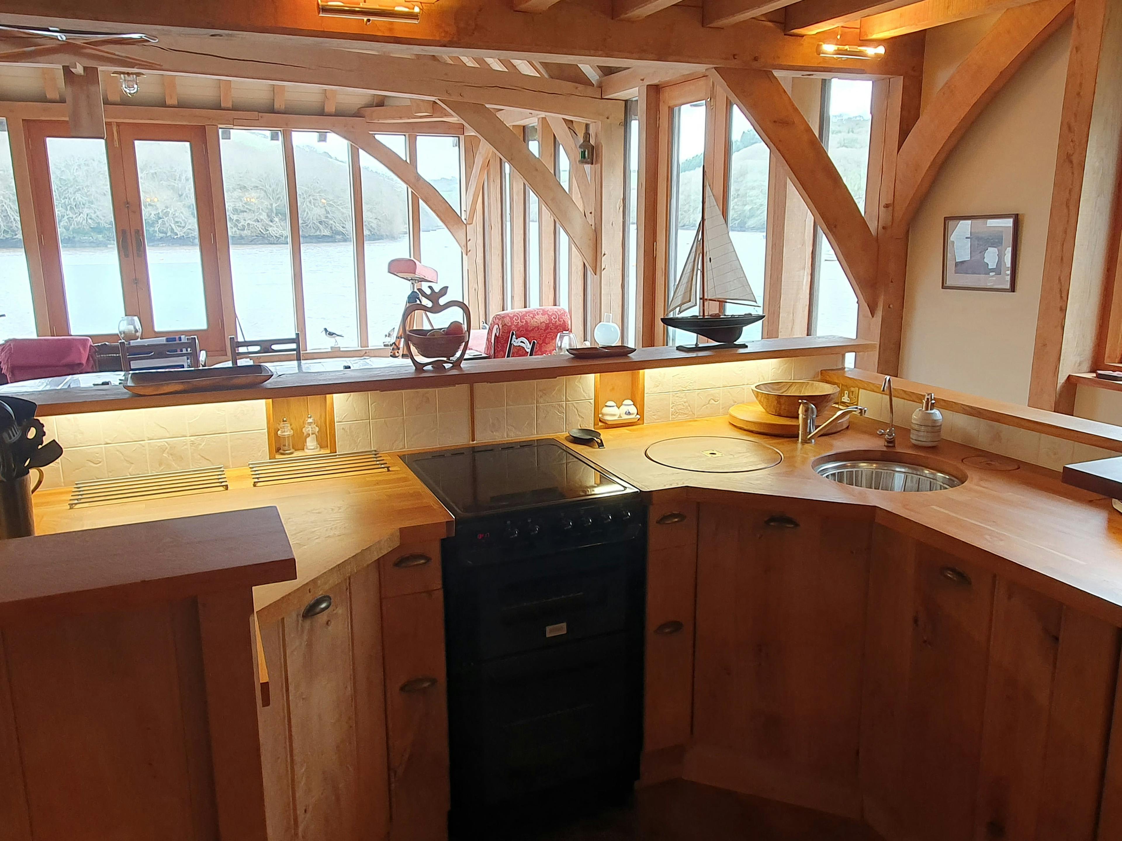 The kitchen area of an oak framed boathouse 