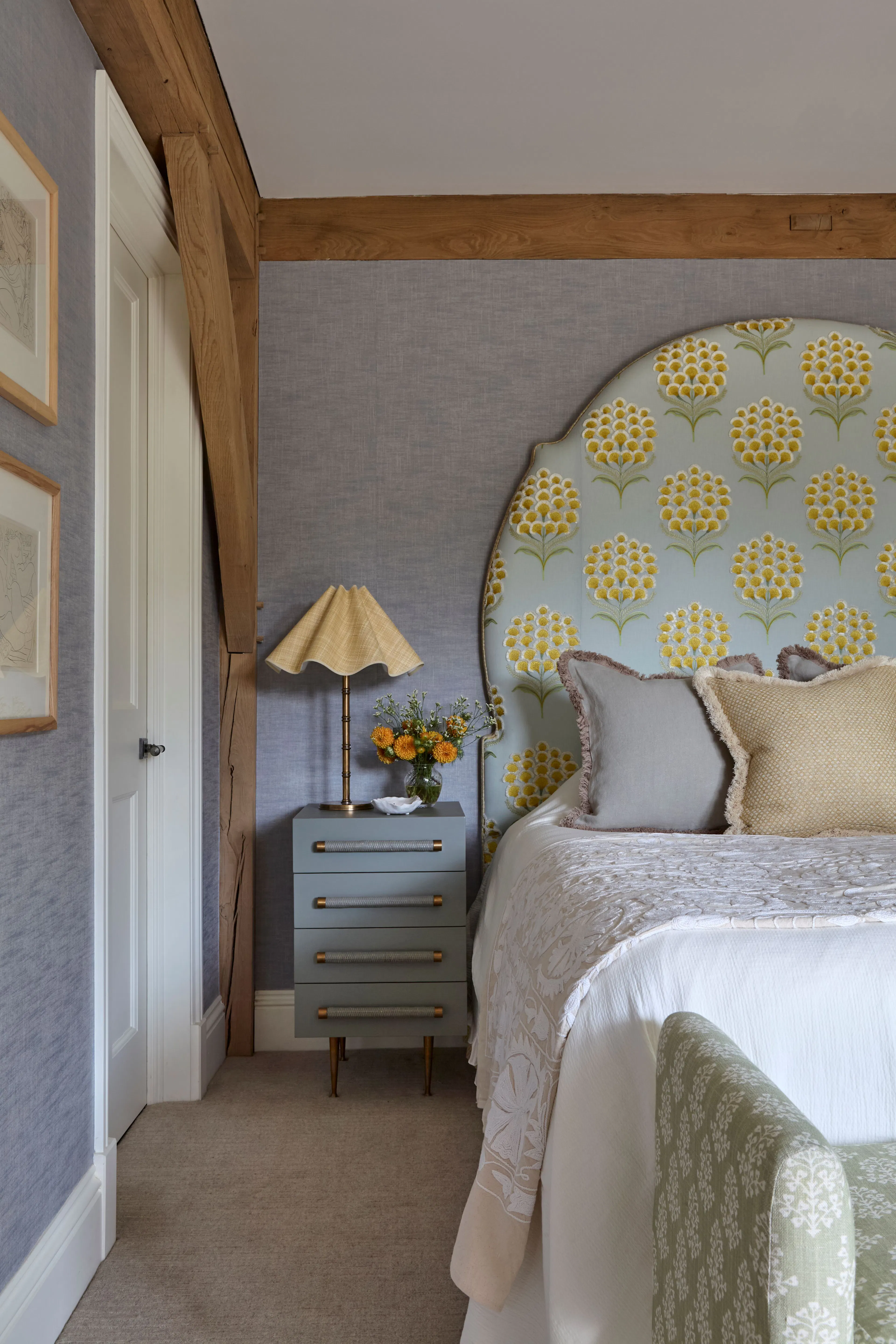 A bedroom in a large 6 bedroom oak framed home