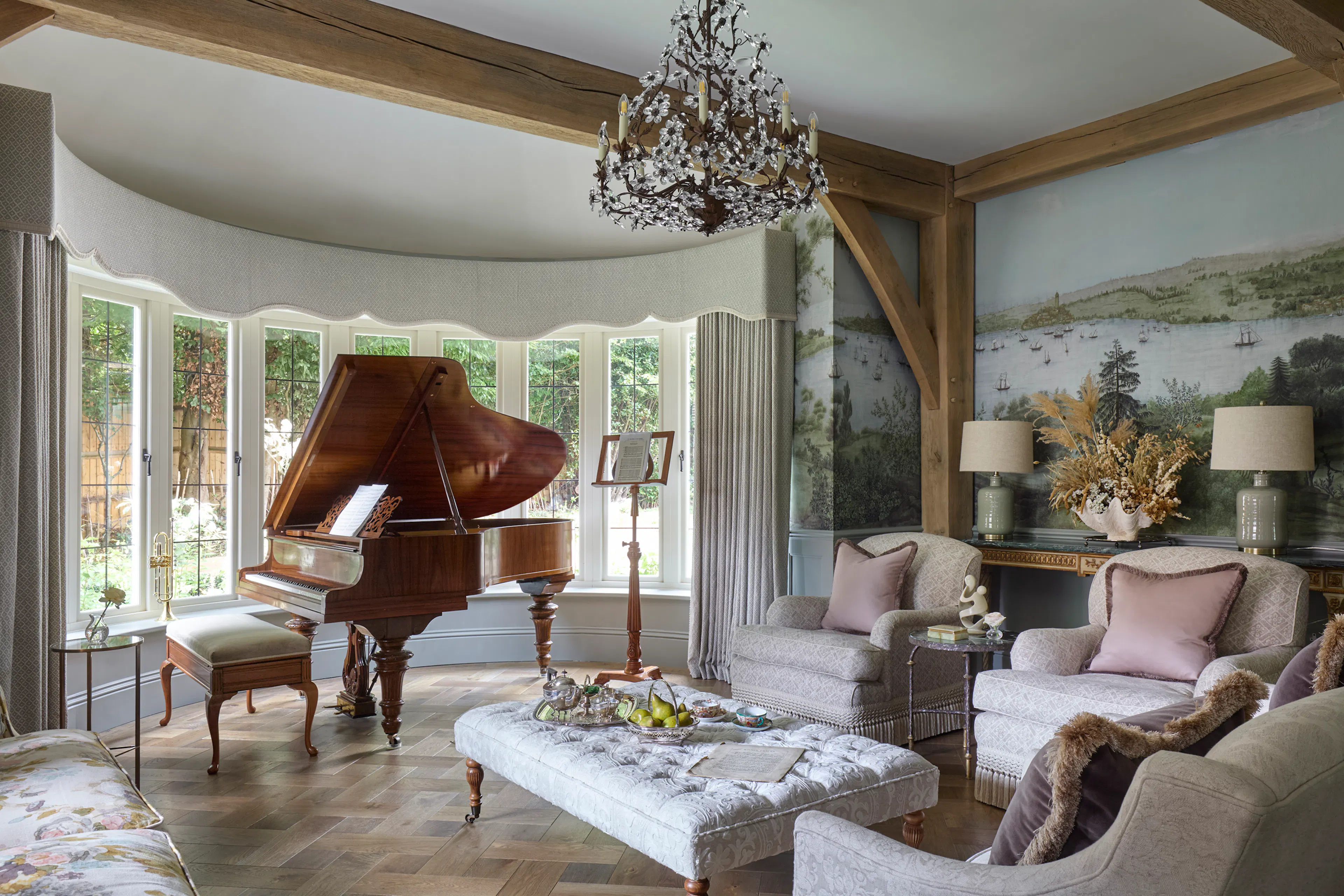 A music room with a grand piano in a bay window of a large 6 bedroom oak framed home