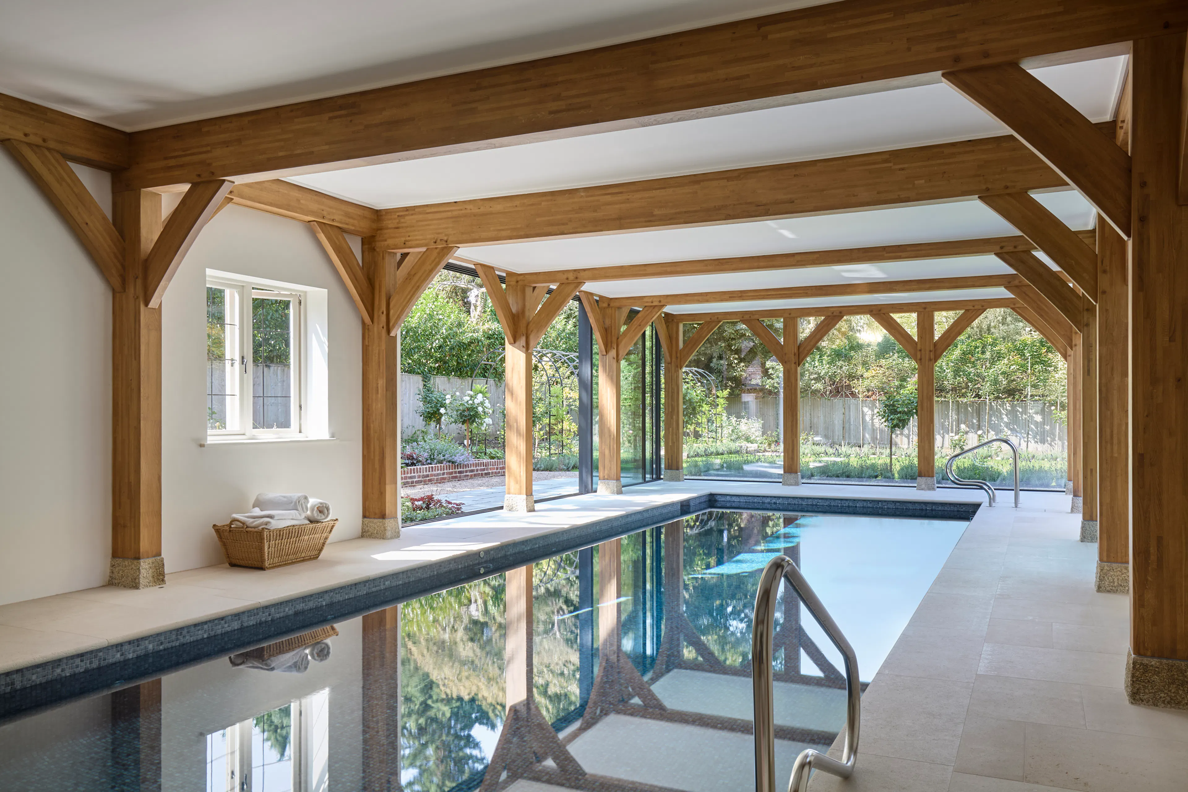 An oak glulam framed swimming pool in a large 6 bedroom oak framed house