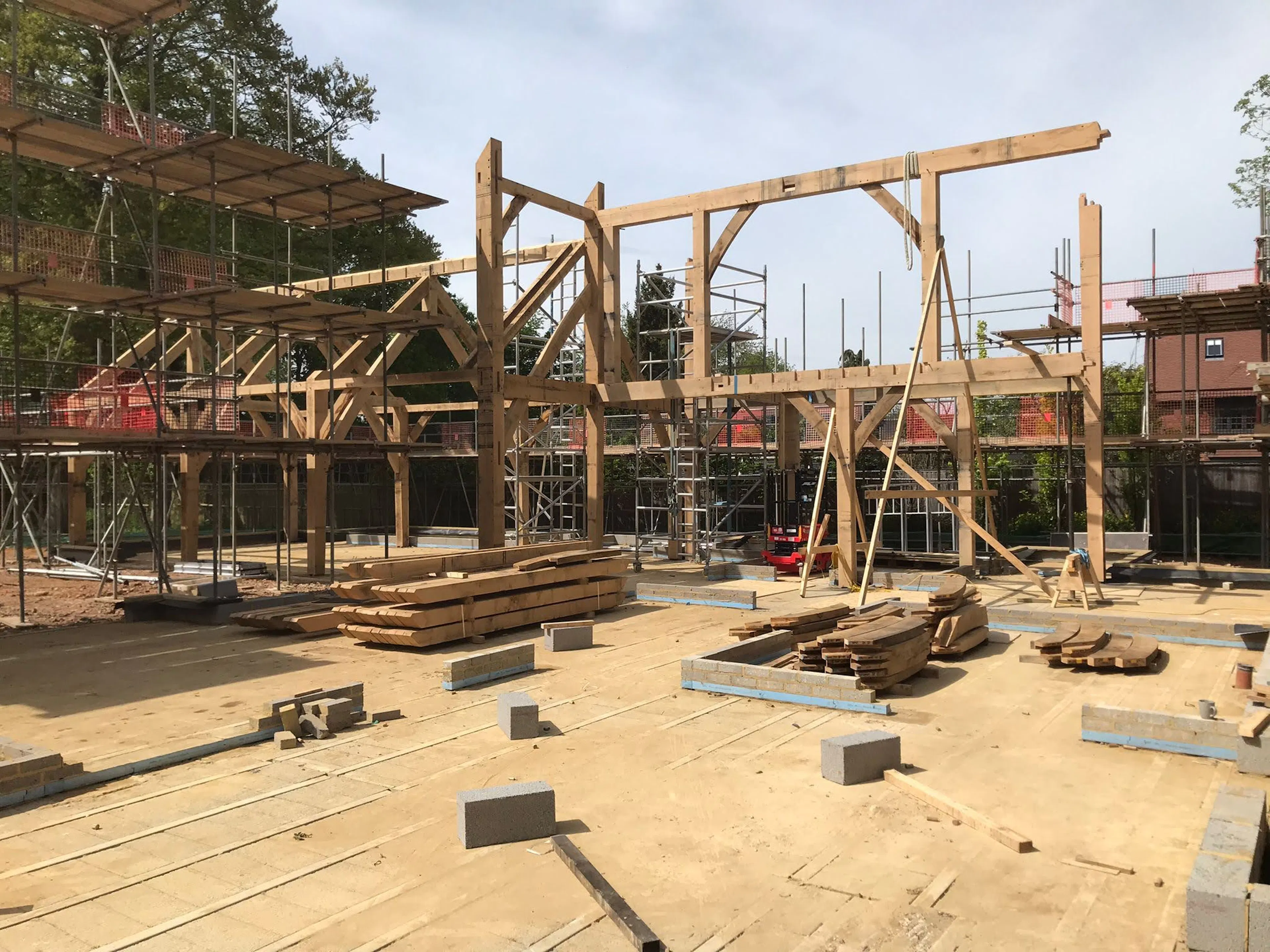 An oak frame on during installation of a large 6 bedroom oak framed family home