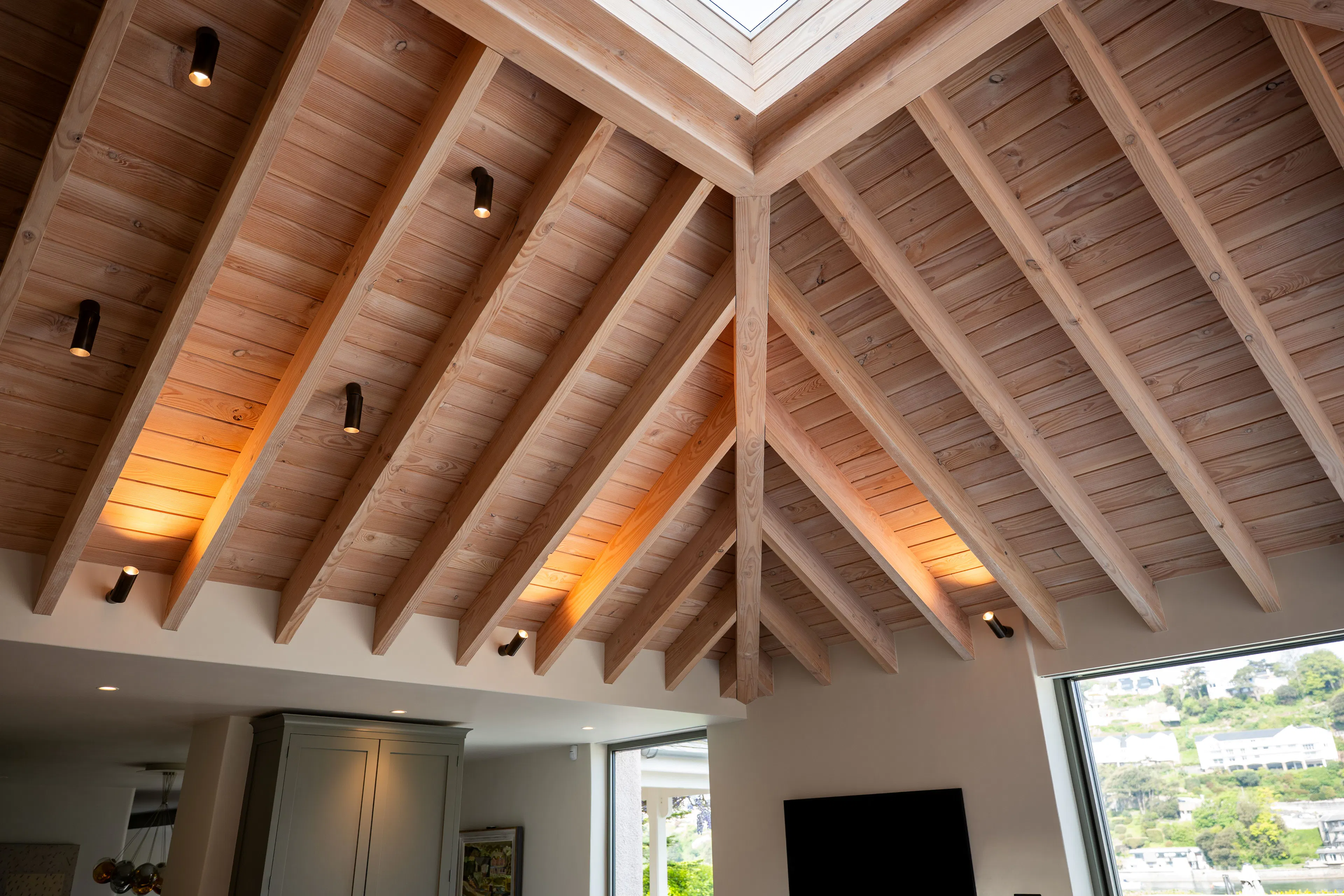 Detail of the timber in a contemporary Douglas fir glulam framed kitchen extension