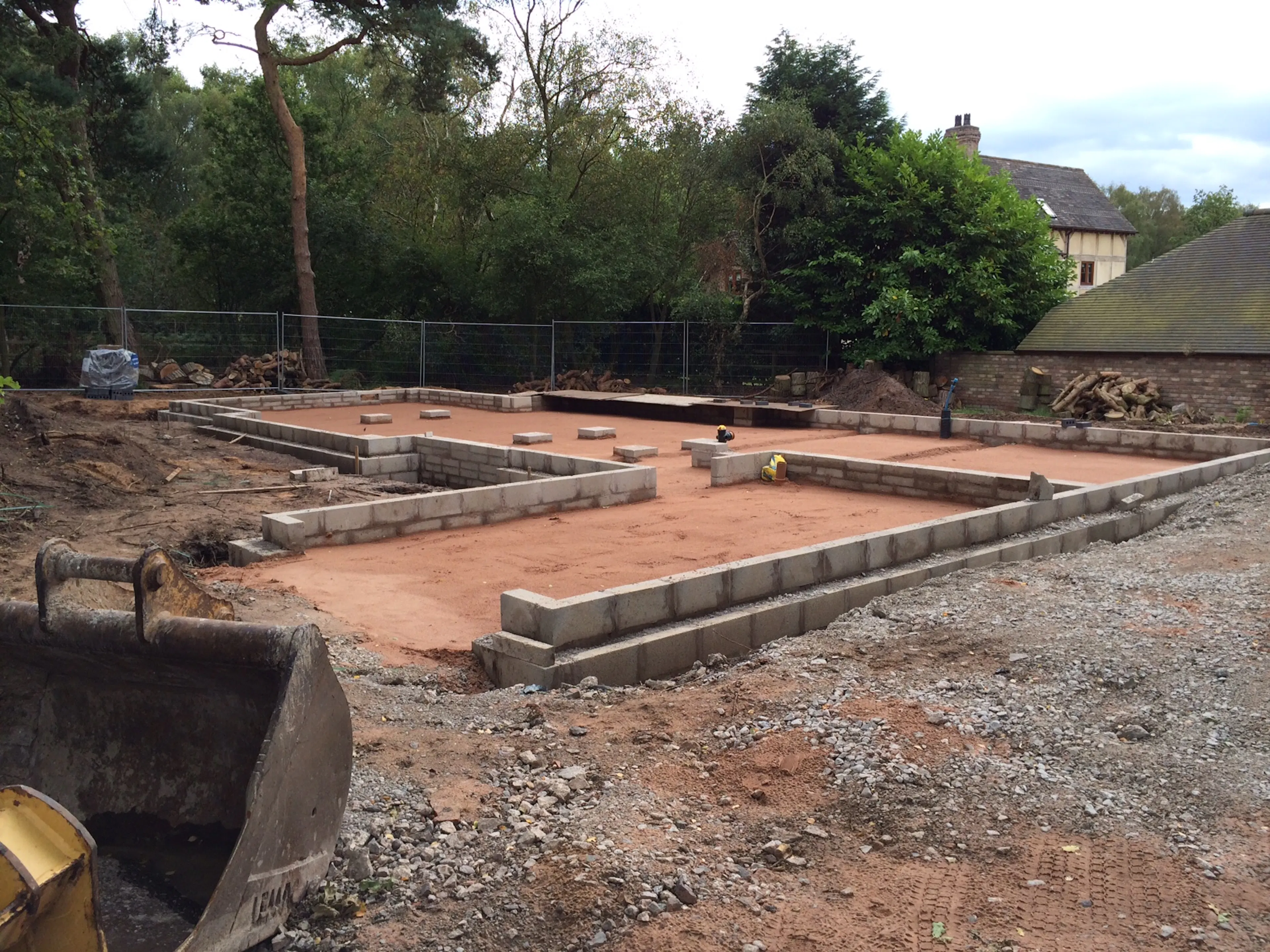 Concrete foundations are ready for an oak frame to be installed for a new home