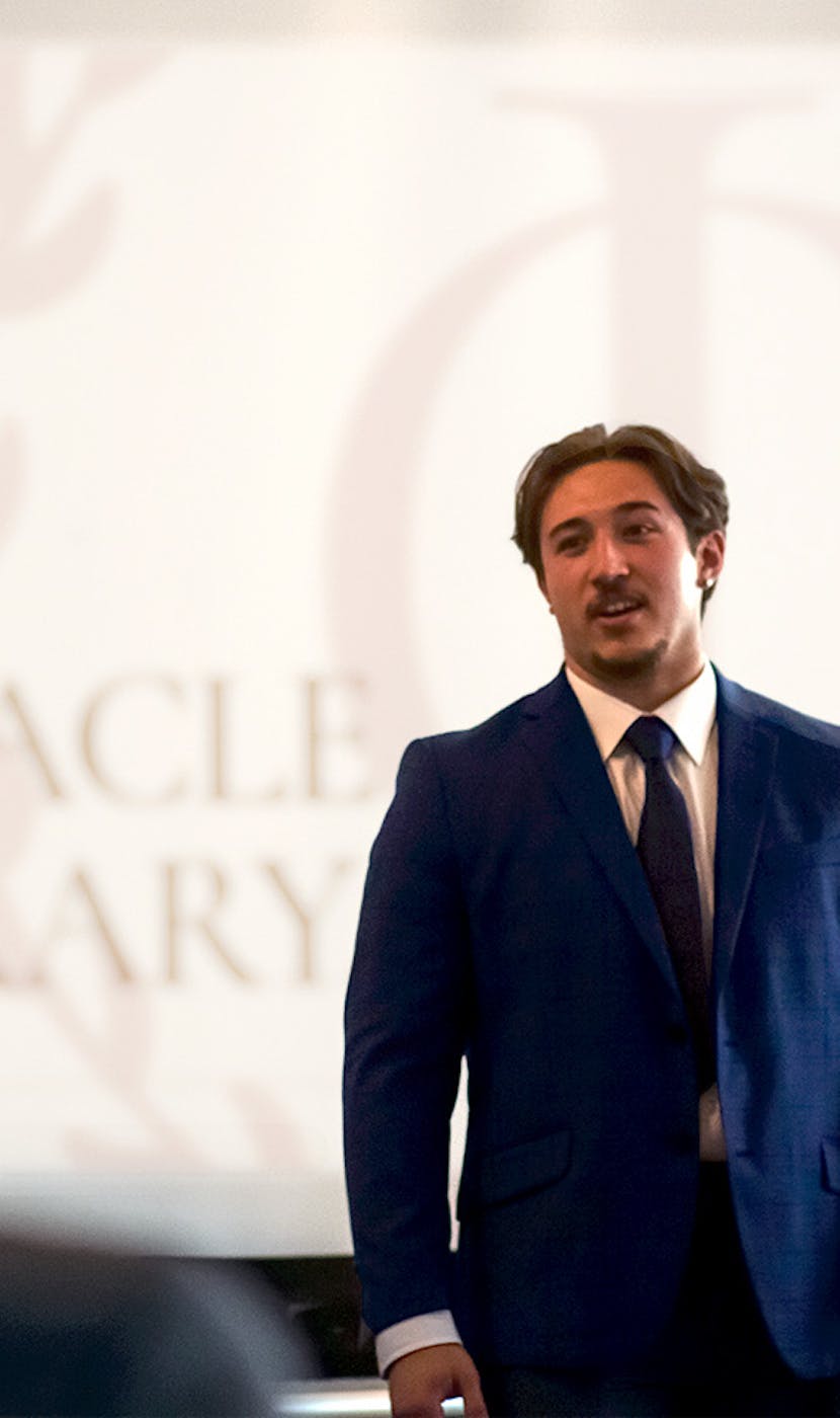 Man standing in front of presentation
