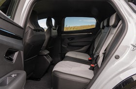 White Renault Megane Etech Electric back seats .