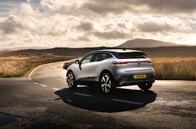 White Renault Megane Etech Electric rear view.