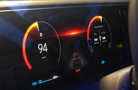 White Renault Megane Etech Electric instrument screen.