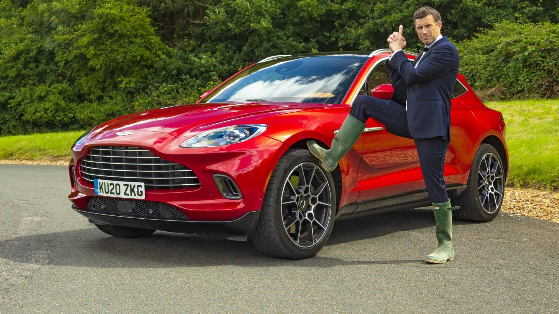 Aston Martin DBX video thumbnail with Mat Watson posing.