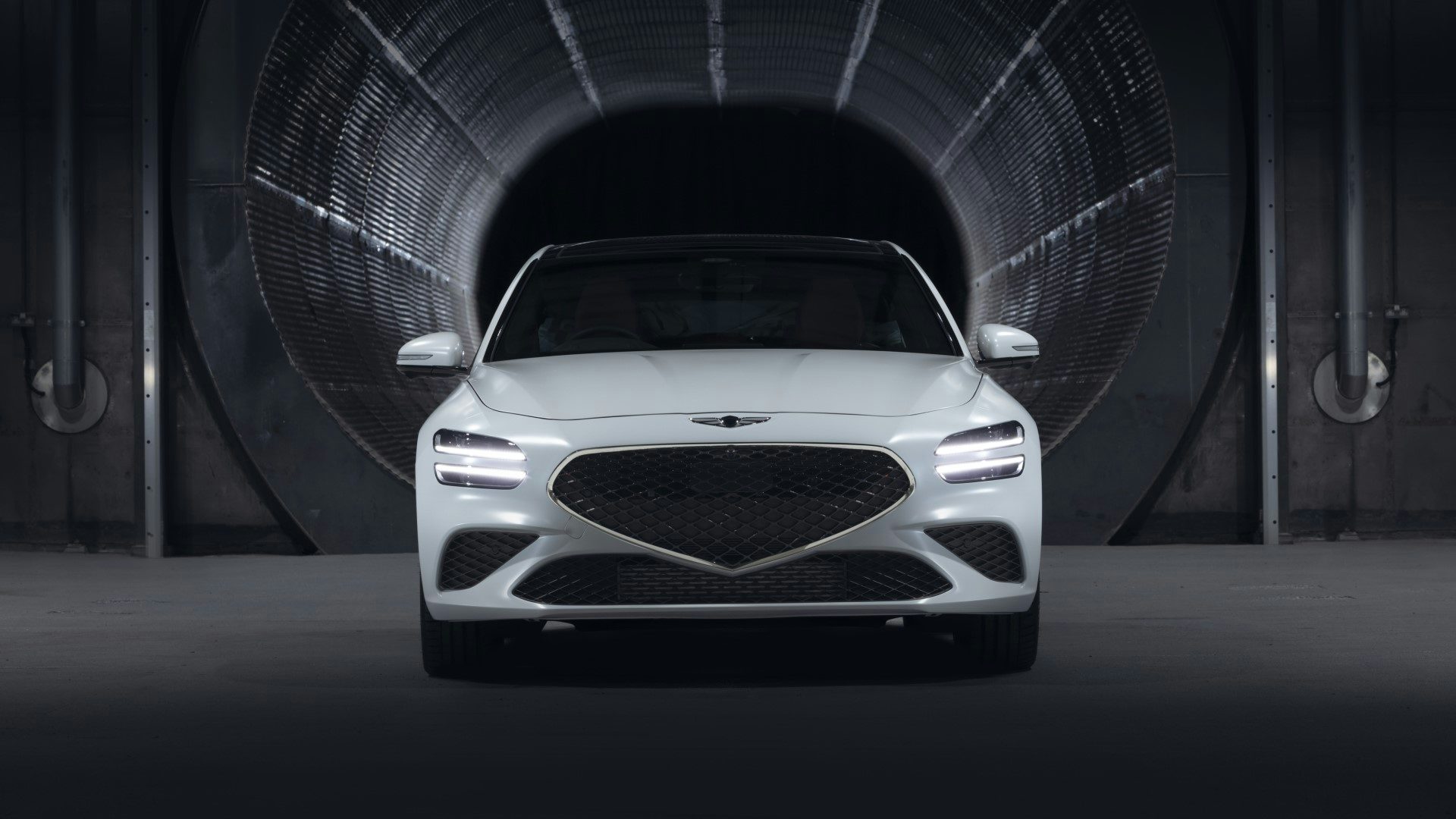 White 2022 Genesis G70 Shooting Brake parked in front of a tunnel, front view