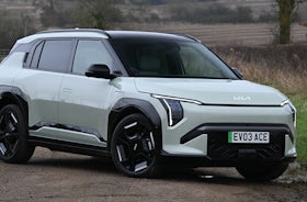 2025 Kia EV3 RHD green exterior front three quarter view static