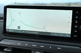 2025 Kia EV3 RHD green interior infotainment screen