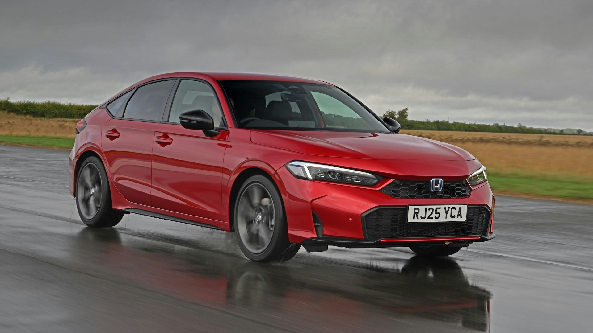 Honda Civic Review 2025 Hybrid Hatchback Interior Price Carwow - Main Image