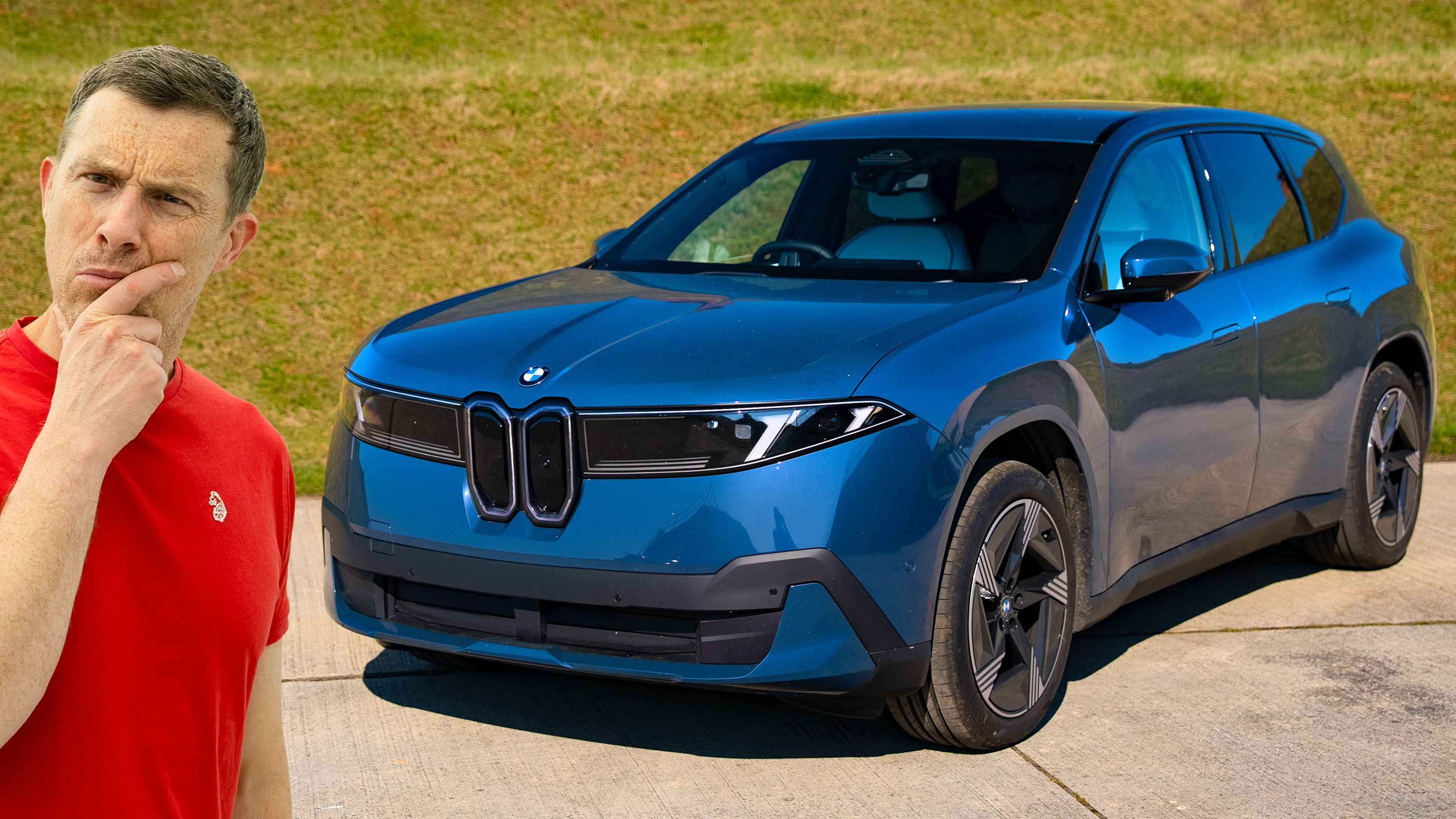 Mat Watson poses with a blue BMW iX3.