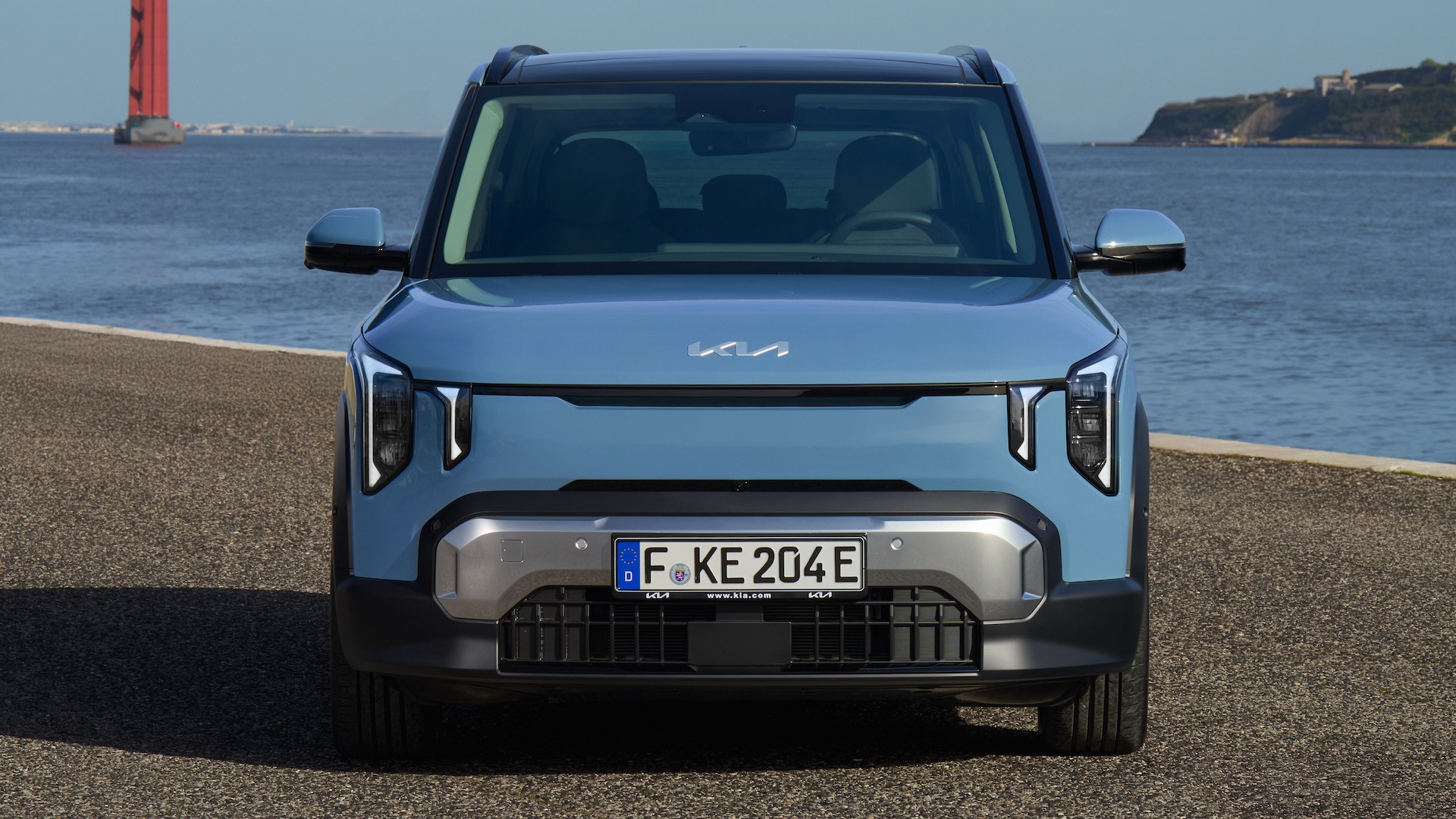 Blue 2026 Kia EV2 parked, front.