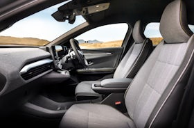 White Renault Megane Etech Electric front seats.