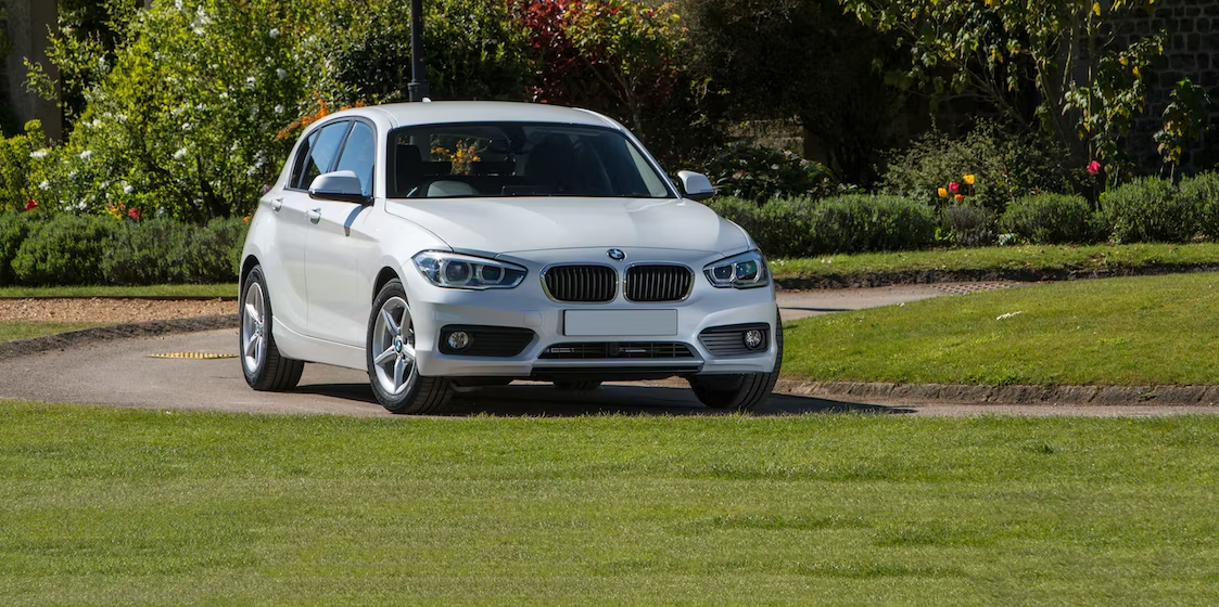 white 2015 bmw 1 series front quarter