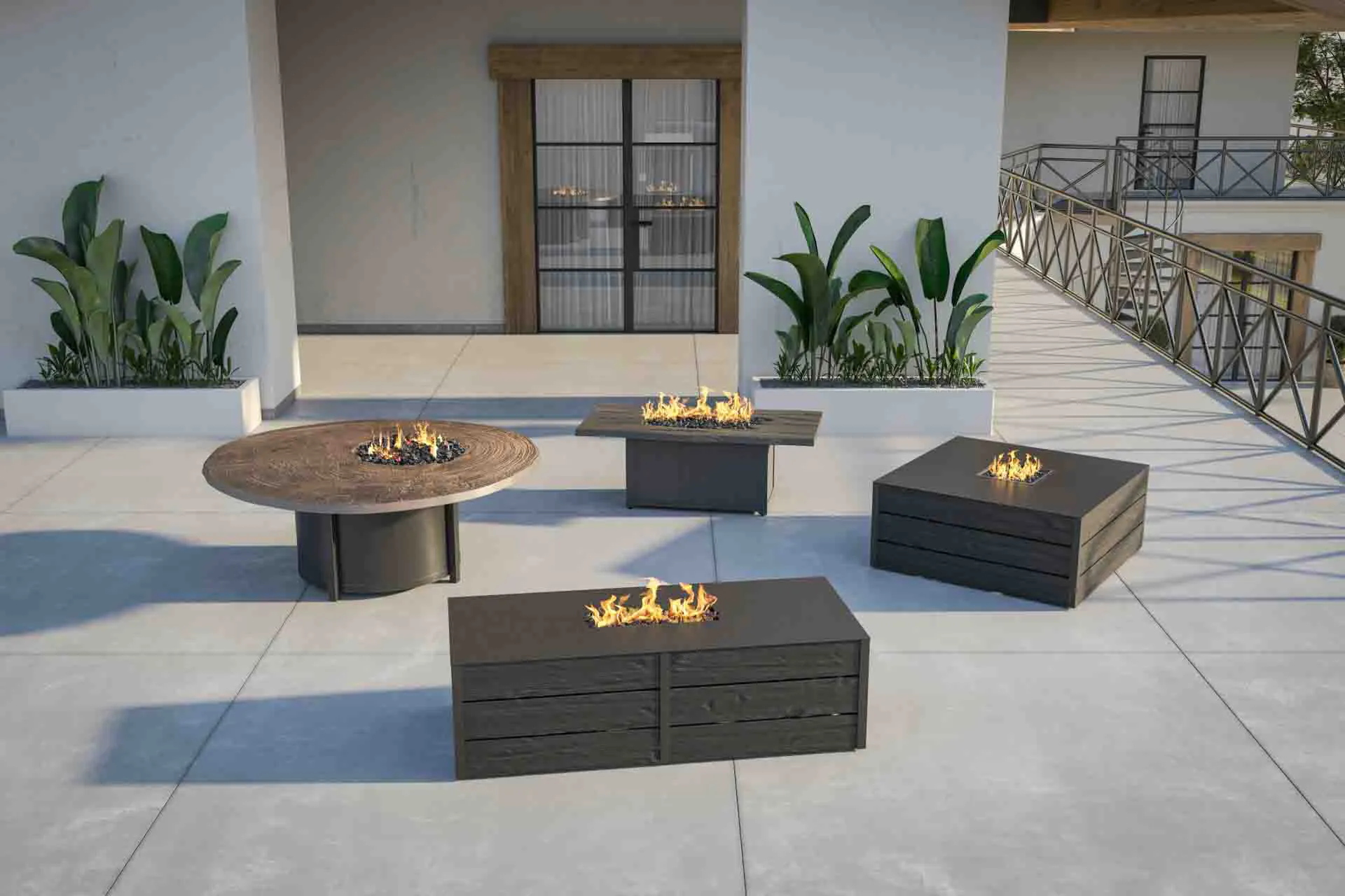 Outdoor terrace with selection of lit fire tables.
