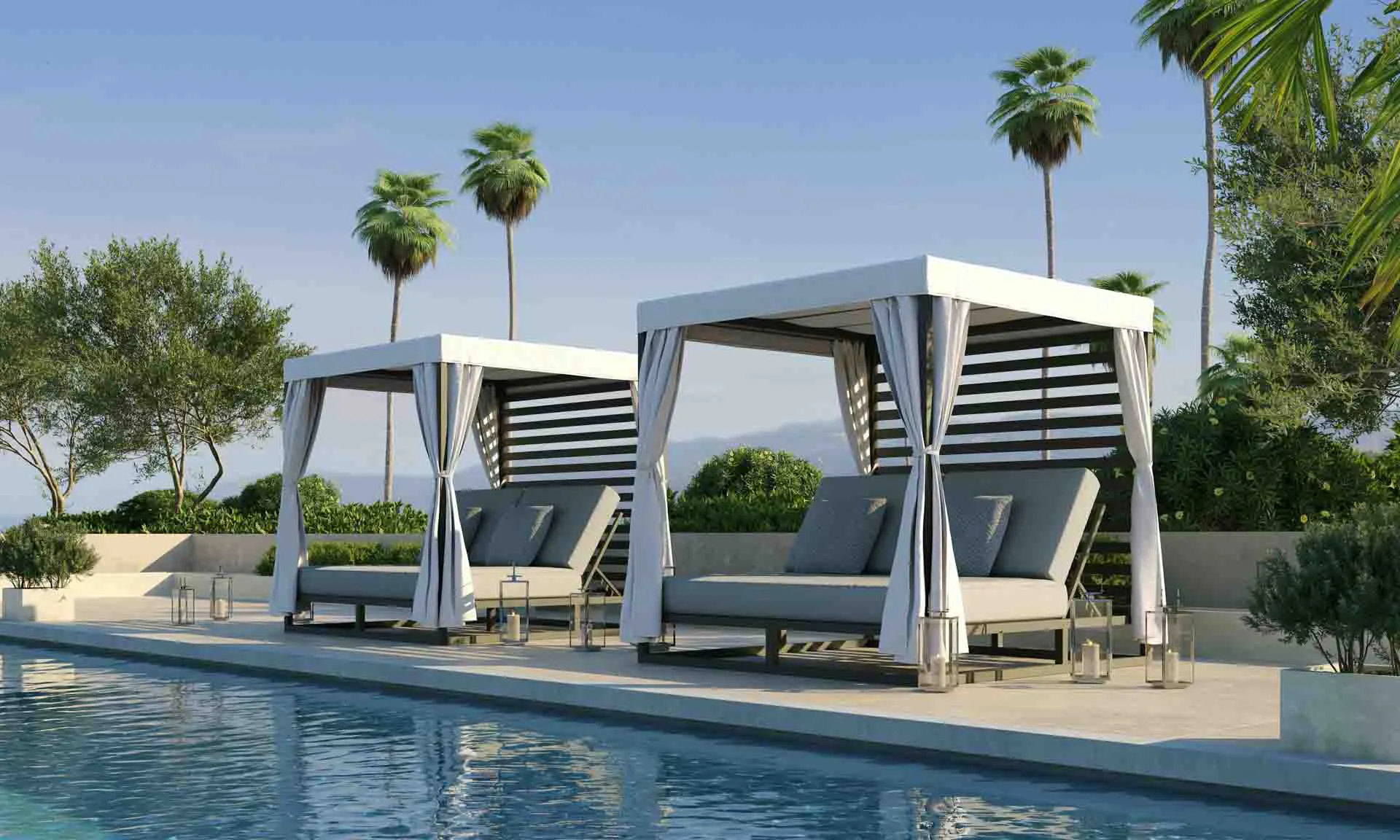 Castelle cabanas in tropical poolside setting.