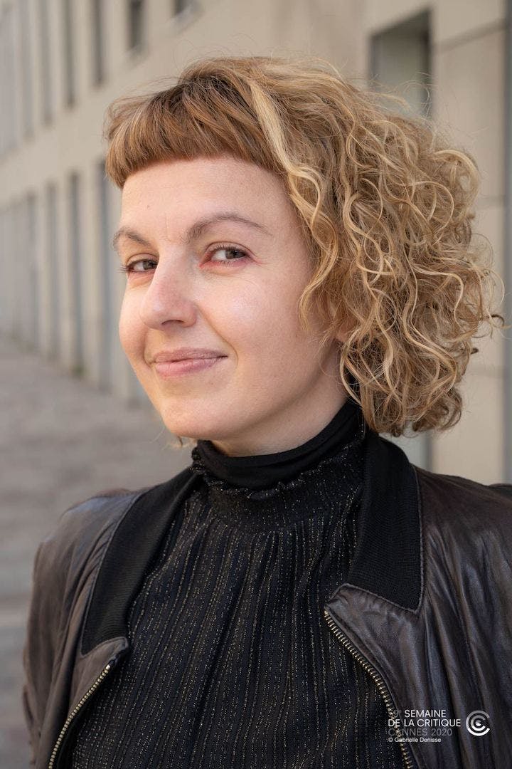 Film director Lillah Halla smiles at the camera