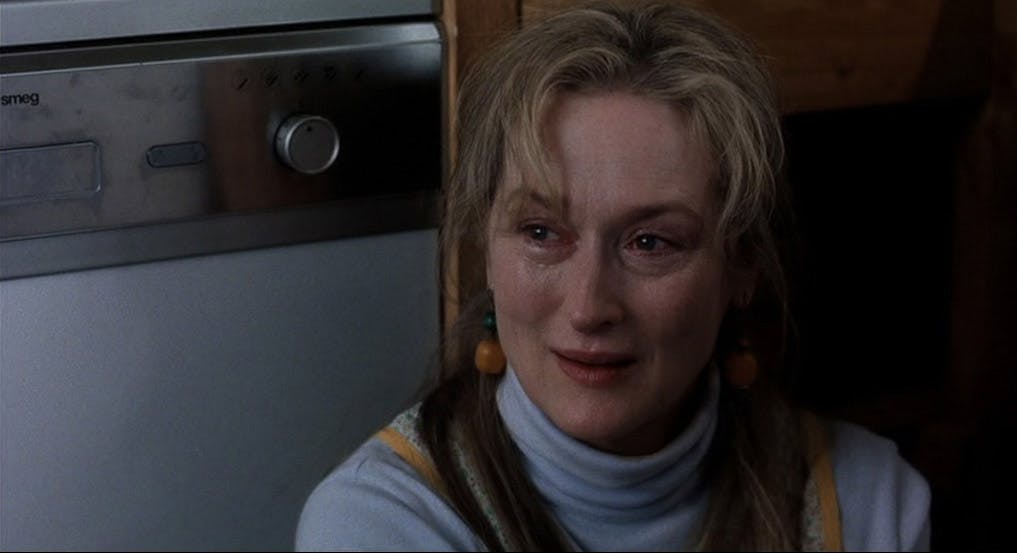 Meryl Streep crying by an oven