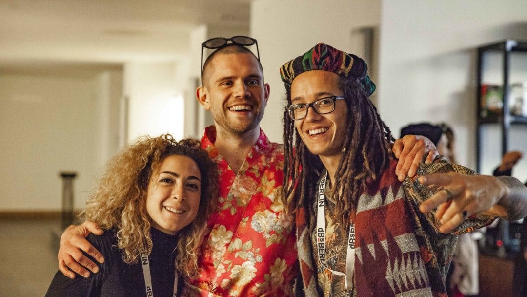 Catalyst students Chiara and Joe smiling wide in celebration of their fellow students at the 2018 graduation ceremony