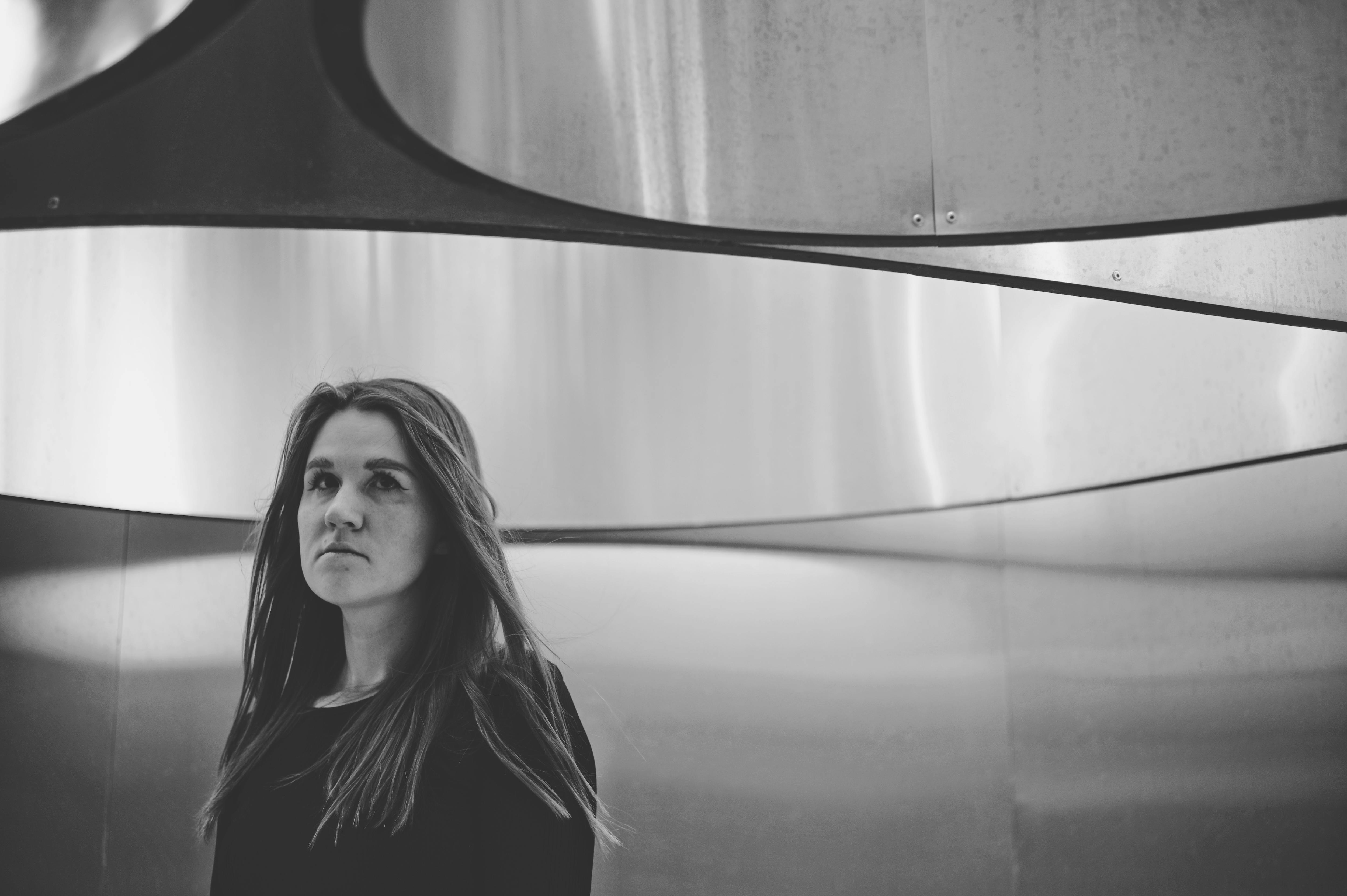 black and white photo of Daria looking into the distance