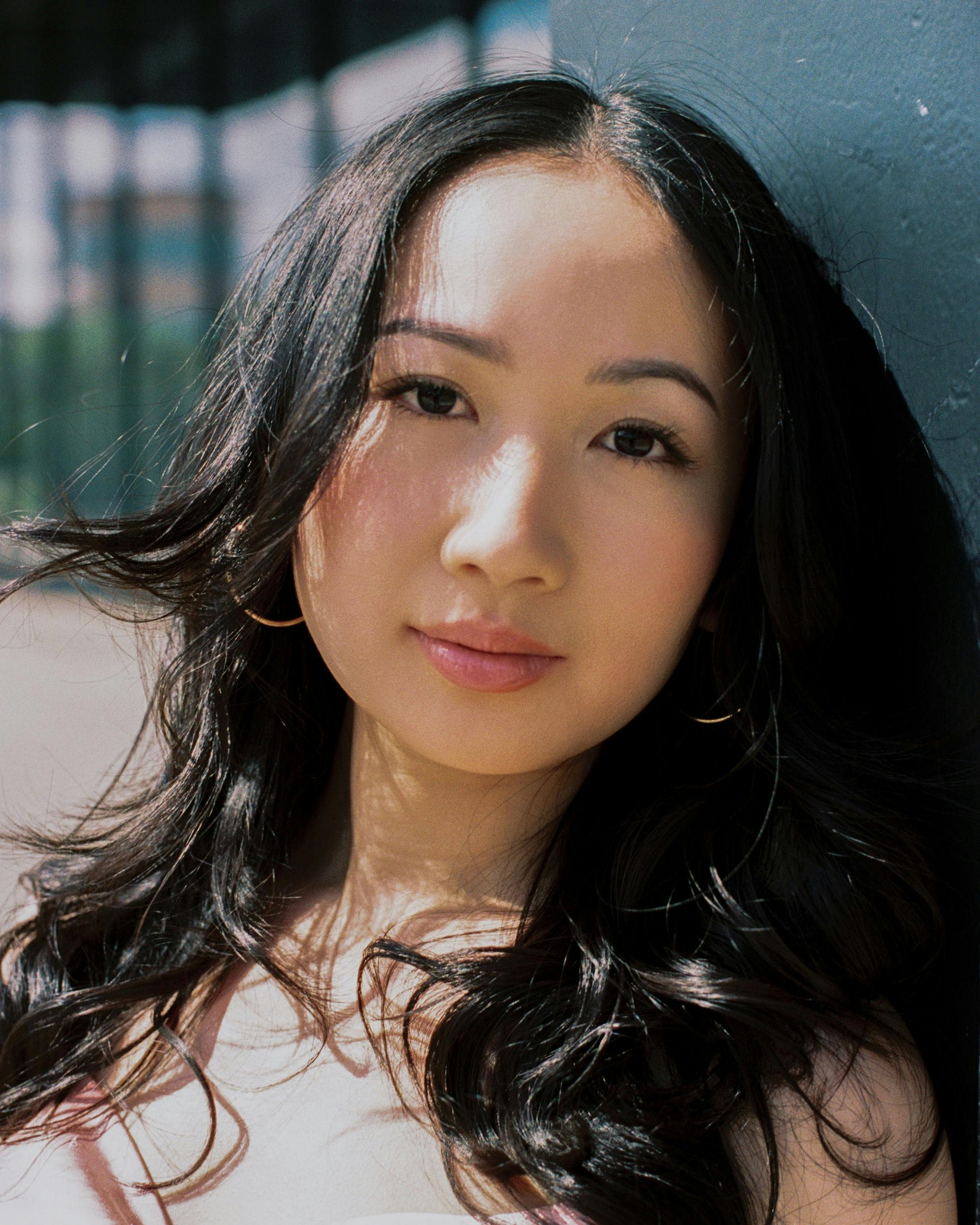 acting graduate rachel leong looks into the camera