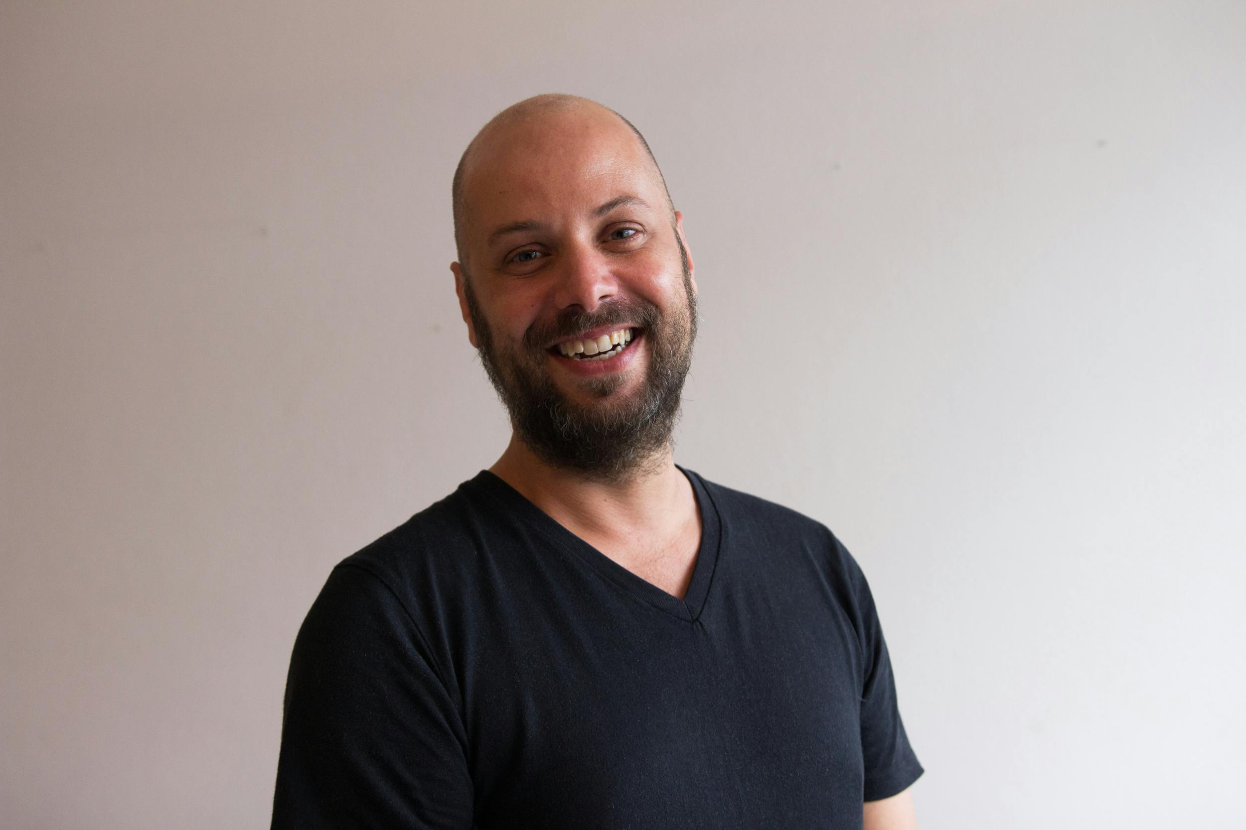 Screenwriting tutor Rafael smiles at the camera