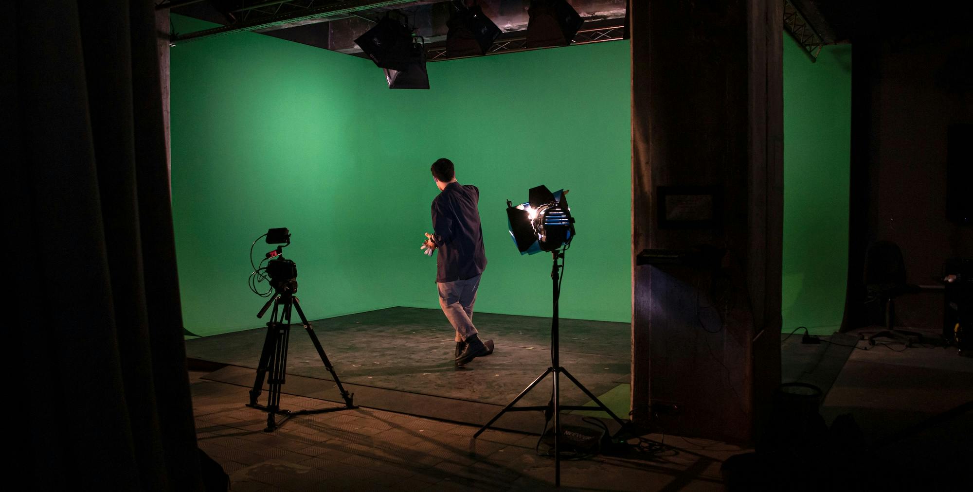 green screen with lighting and person