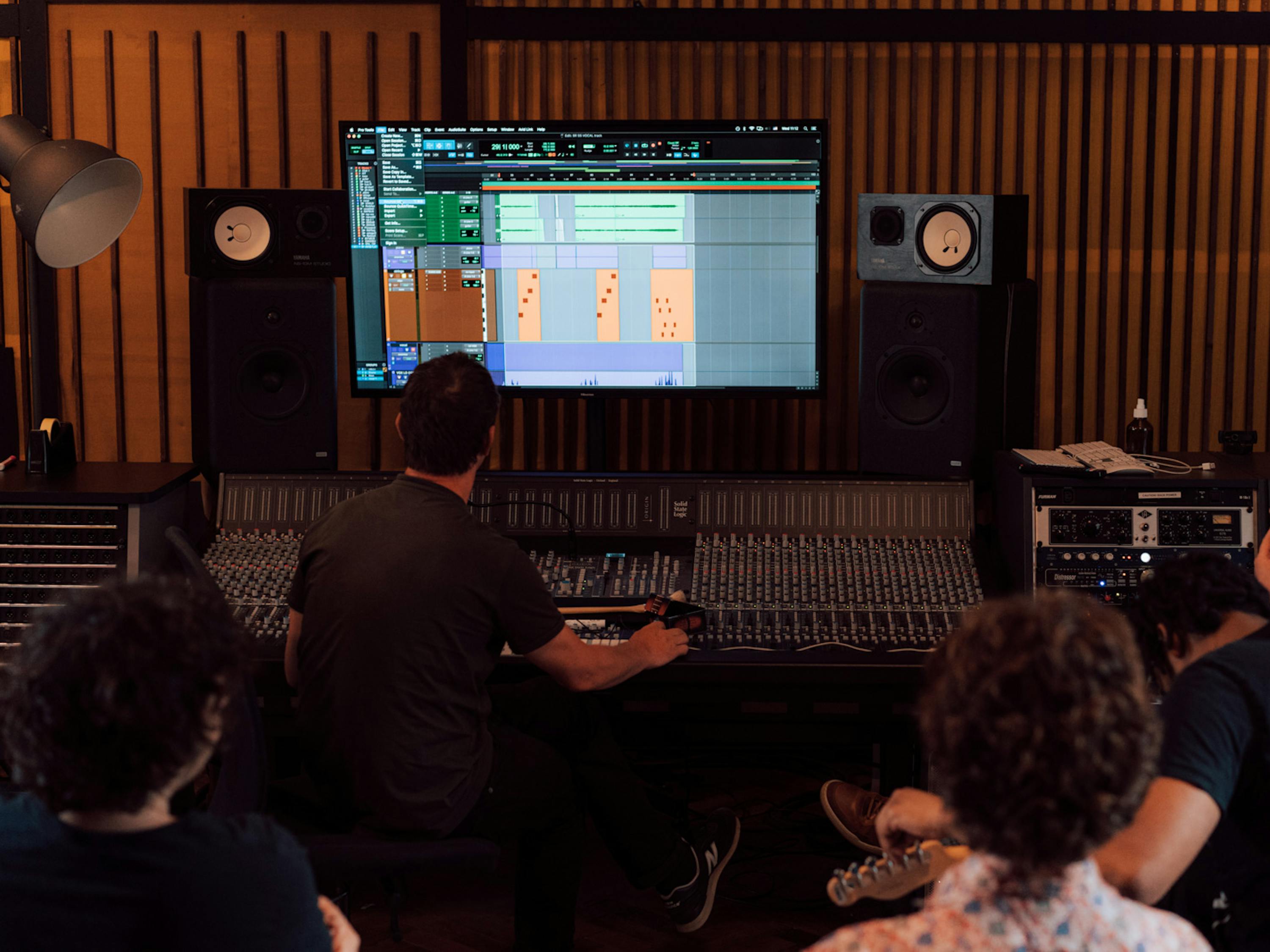 Audio production students in a mixing and mastering class with the SSL console at our K4 studio at Funkhaus. 