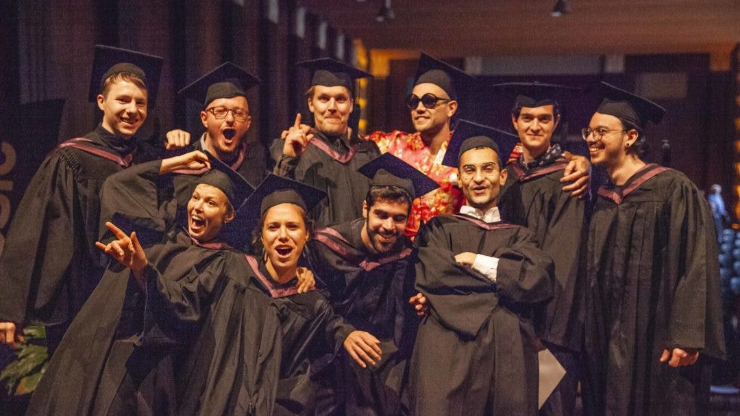 Catalyst graduate students smiling wide in celebration of their success