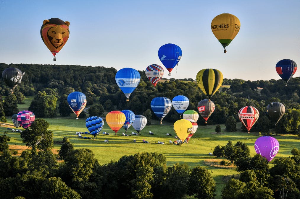 Hot air balloons floating in the sky at the Bristol International Balloon Fiesta