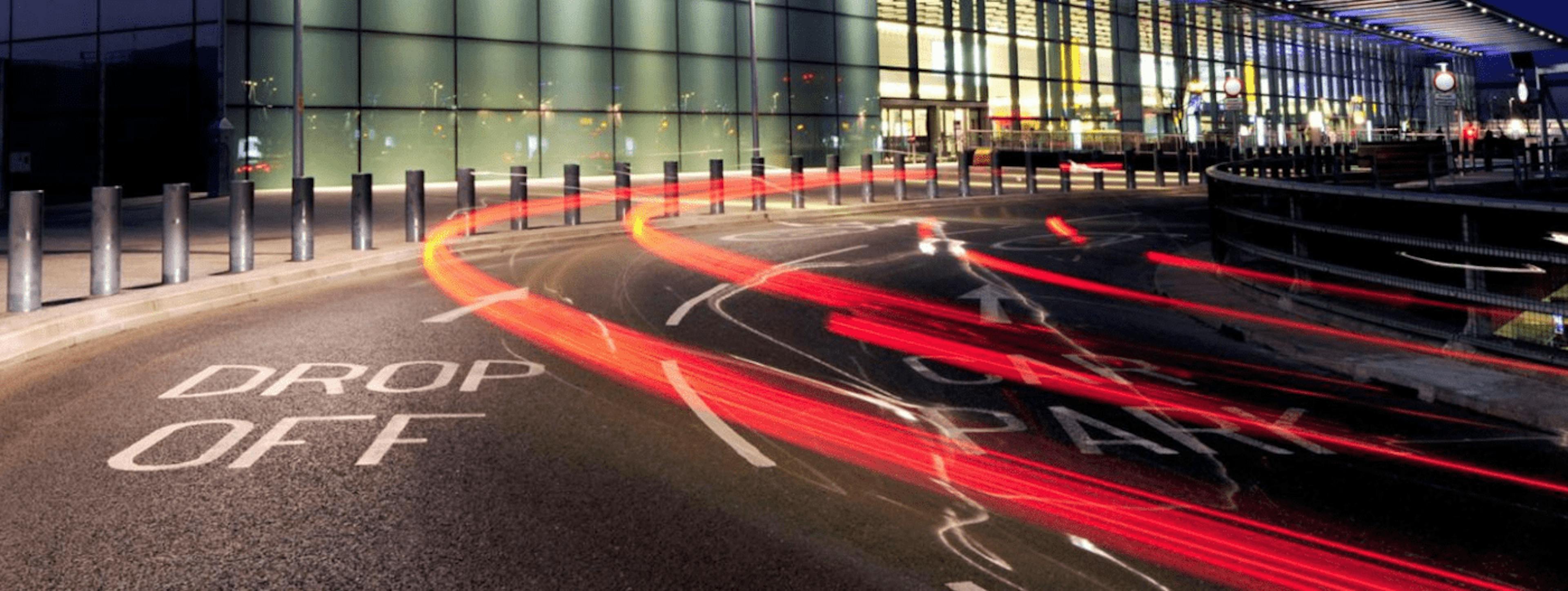 Road marking the Heathrow drop off are at a Heathrow terminal