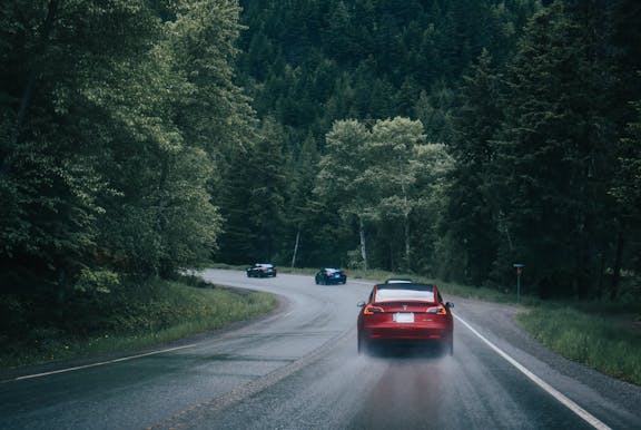 Red electric car on the road