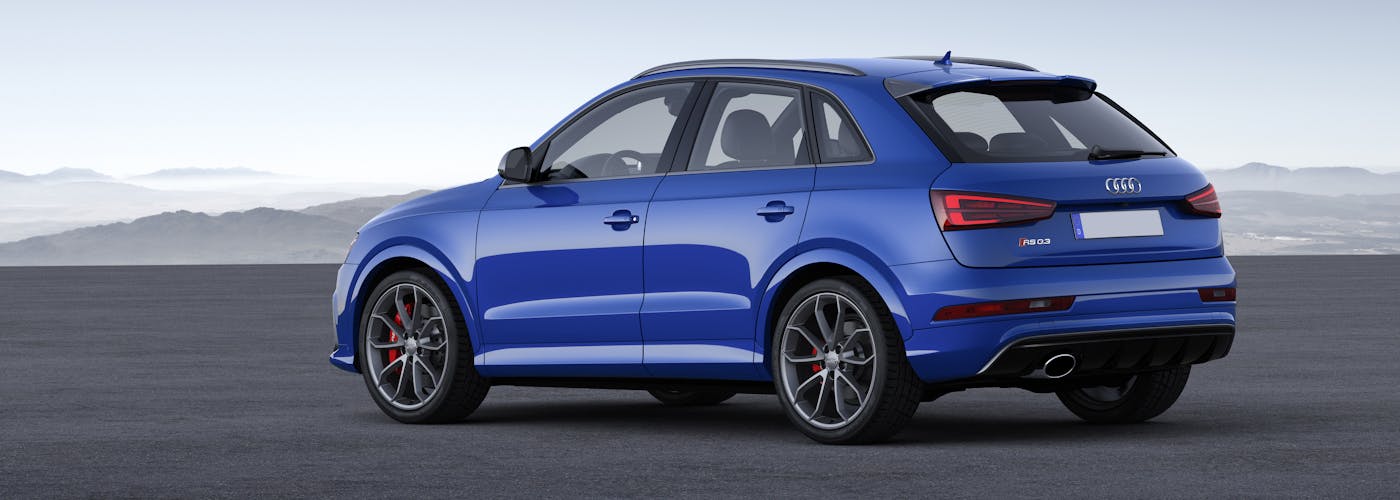The rear exterior of a blue Audi Q3