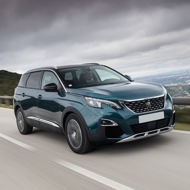 The front exterior of a green Peugeot 5008