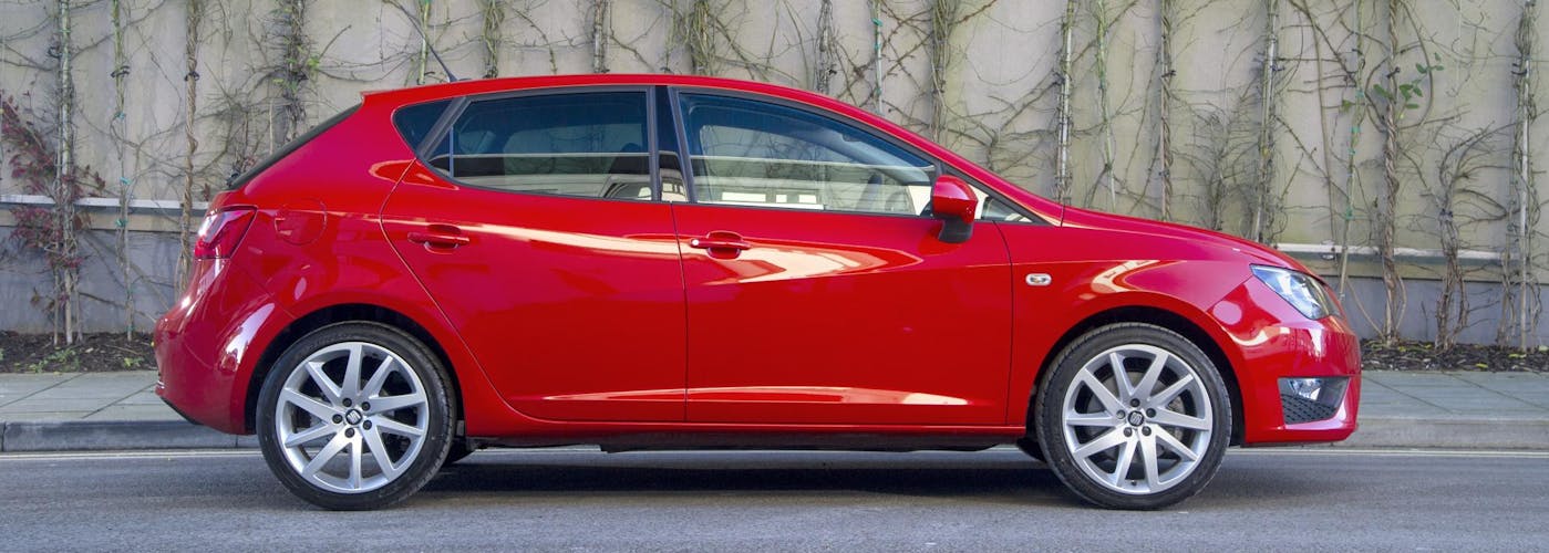 The exterior of a red Seat Ibiza